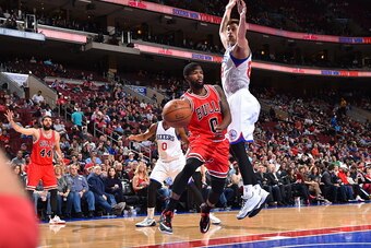 PHILADELPHIA, PA - NOVEMBER 7:  Aaron Brooks #0 of the Chicago Bulls passes the ball against against the Philadelphia 76ers on November 7, 2014 at the Wells Fargo Center in Philadelphia, Pennsylvania.  NOTE TO USER: User expressly acknowledges and agrees 