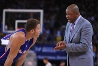 November 5, 2014; Oakland, CA, USA; Los Angeles Clippers head coach Doc Rivers (right) instructs forward Blake Griffin (32) during the third quarter against the Golden State Warriors at Oracle Arena. The Warriors defeated the Clippers 121-104. Mandatory C