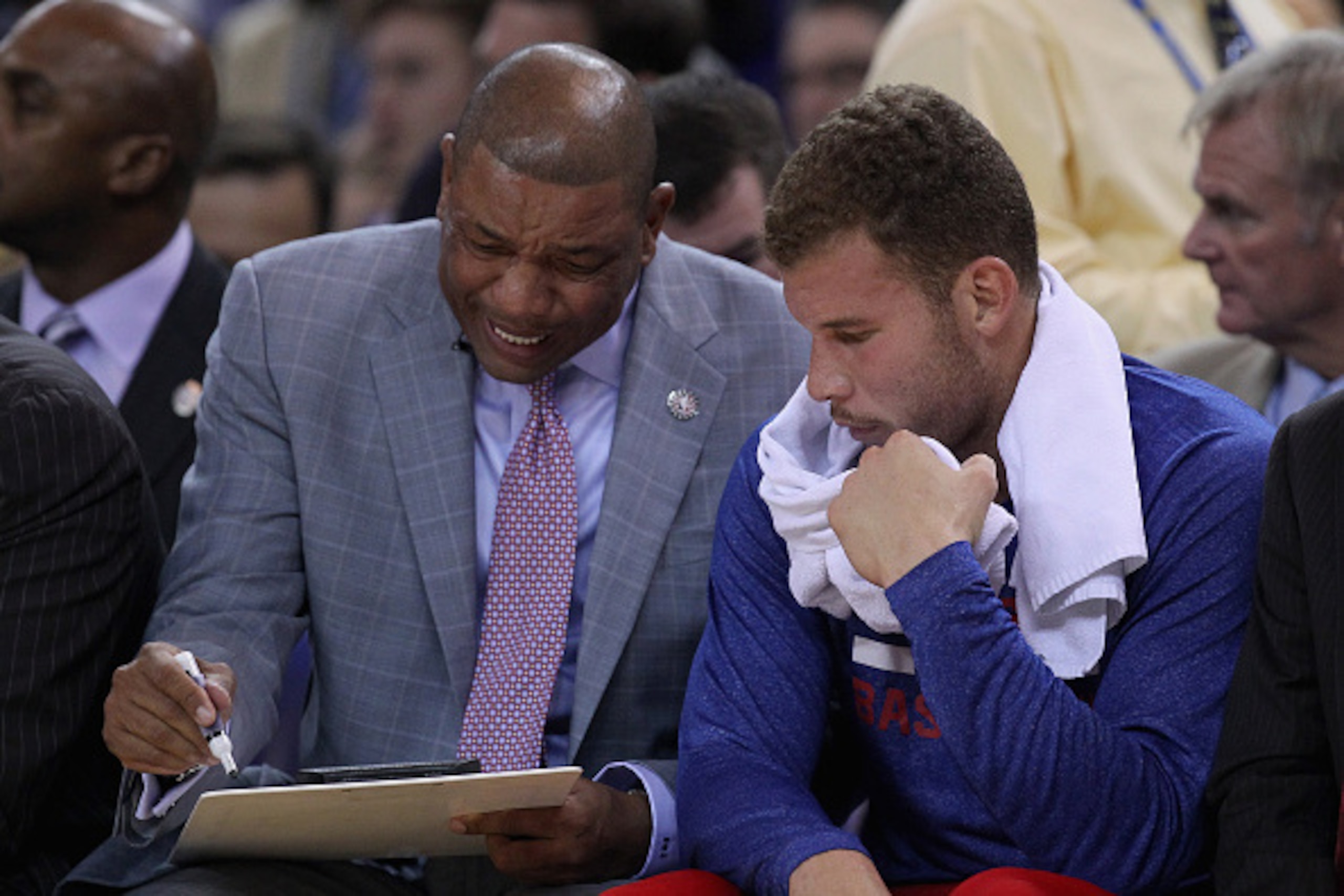 OAKLAND, CA - NOVEMBER 05:  Head coach Doc Rivers of the Los Angeles Clippers talks to Blake Griffin #32 on the bench during their game against the Golden State Warriors at ORACLE Arena on November 5, 2014 in Oakland, California. NOTE TO USER: User expres