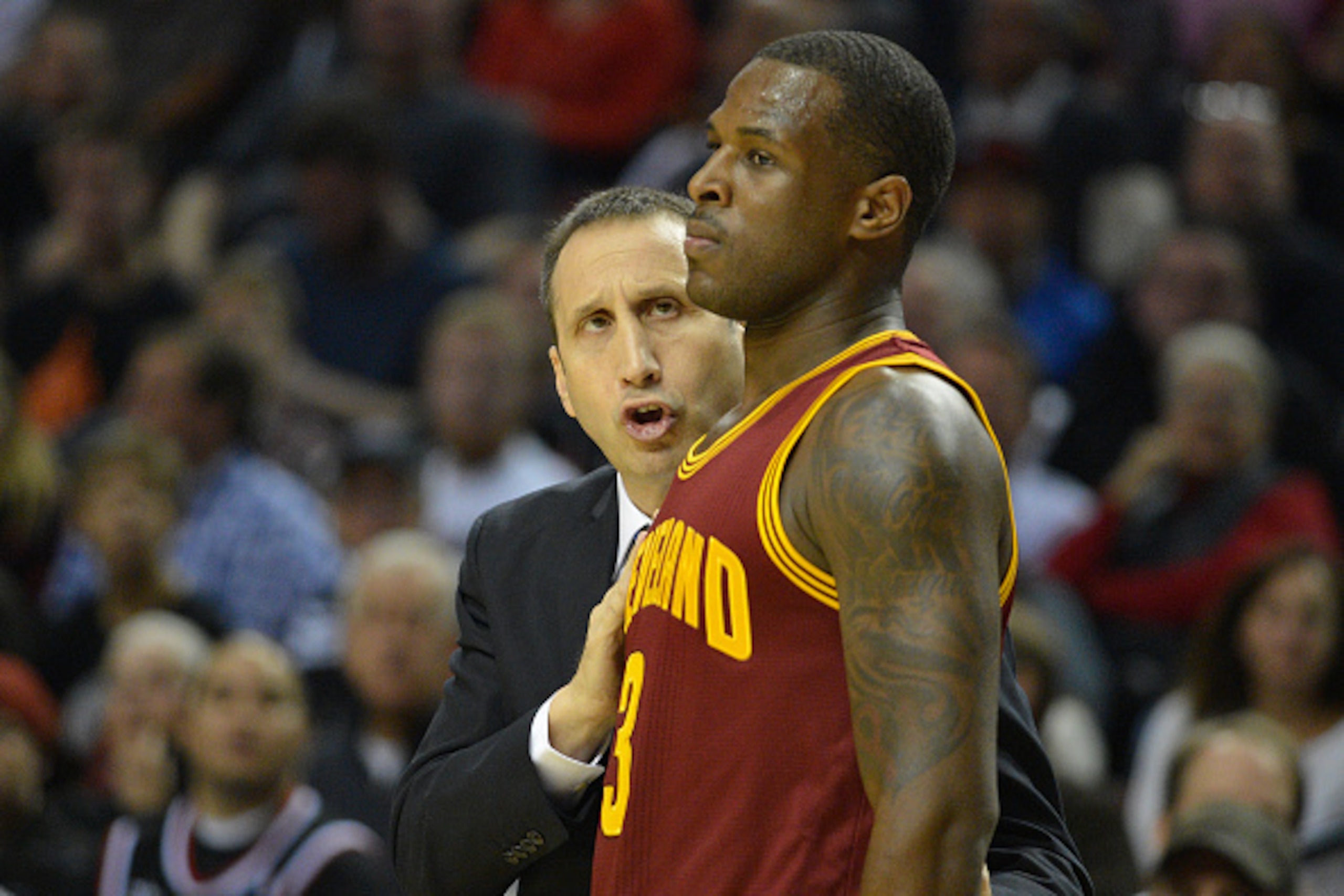 PORTLAND, OR - NOVEMBER 04: Head coach David Blatt of the Cleveland Cavaliers speaks with Dion Waiters #3 of the Cleveland Cavaliers during the second quarter of the game against the Portland Trail Blazers at Moda Center on November 4, 2014 in Portland, O