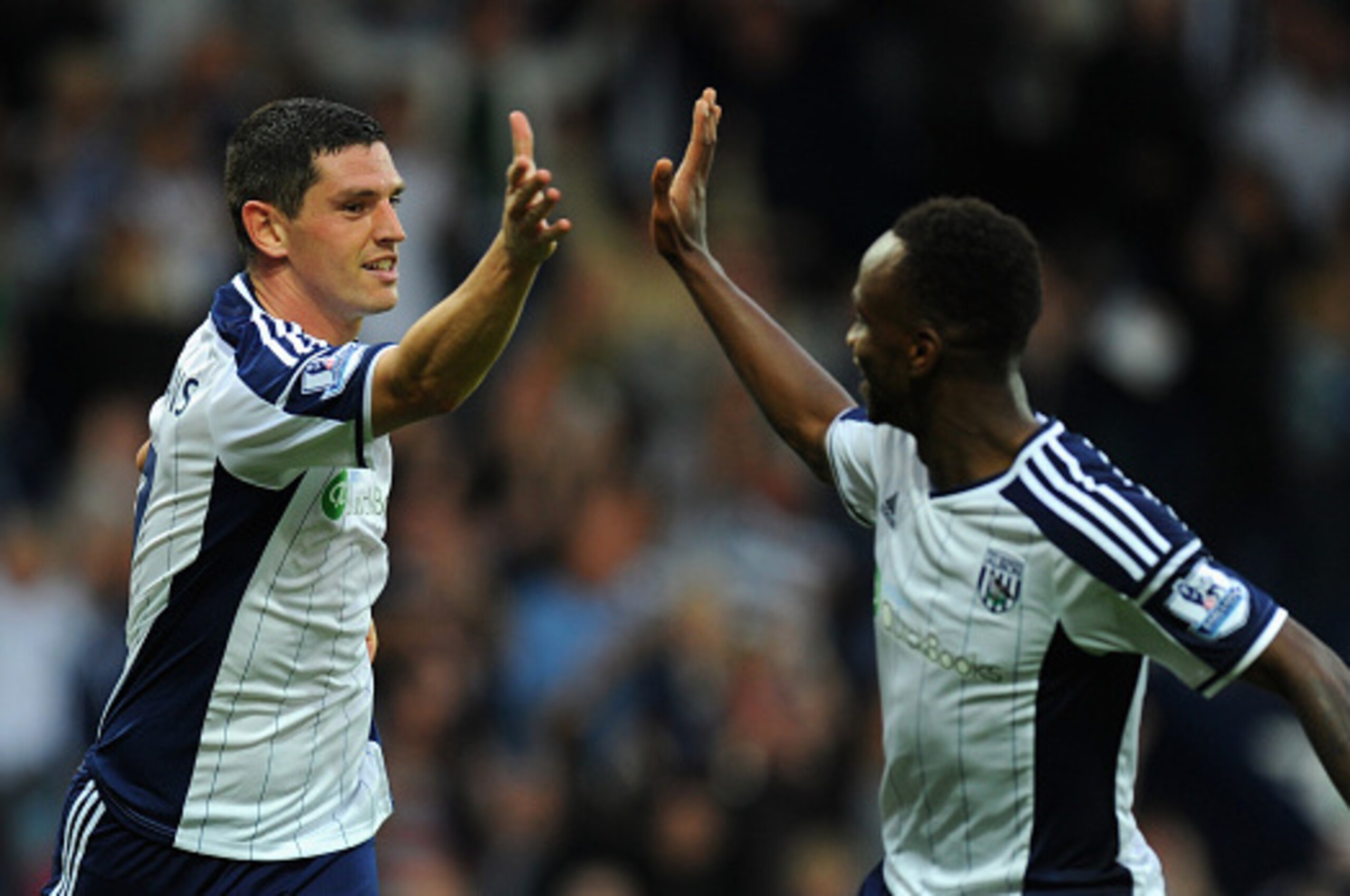 WEST BROMWICH, ENGLAND - SEPTEMBER 28:  WBA goalscorer Graham Dorrans (l) celebrates his goal with  Saido Berahino during the Barclays Premier League match between West Bromwich Albion and Burnley at The Hawthorns on September 28, 2014 in West Bromwich, E