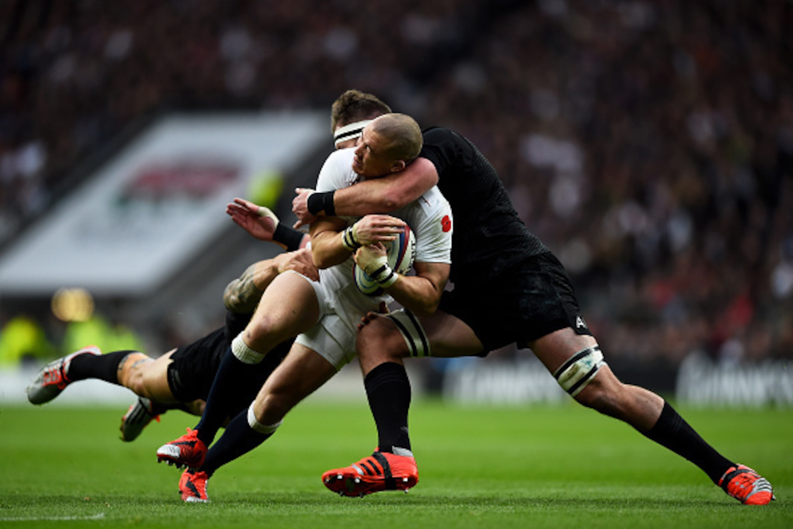 LONDON, ENGLAND - NOVEMBER 08: Mike Brown of England is held up by the New Zealand defence during the QBE International match between England and New Zealand at Twickenham Stadium on November 8, 2014 in London, England.  (Photo by Laurence Griffiths/Getty