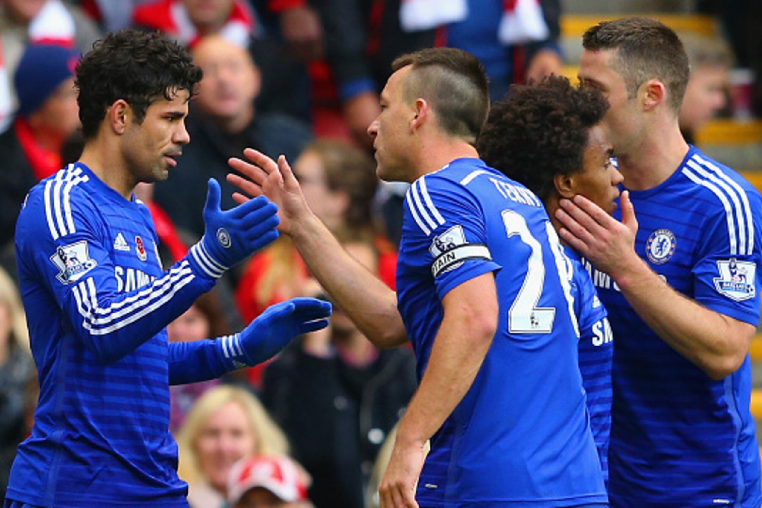 LIVERPOOL, ENGLAND - NOVEMBER 08:  Diego Costa of Chelsea celebrates scoring their second goal with John Terry of Chelsea during the Barclays Premier League match between Liverpool and Chelsea at Anfield on November 8, 2014 in Liverpool, England.  (Photo 