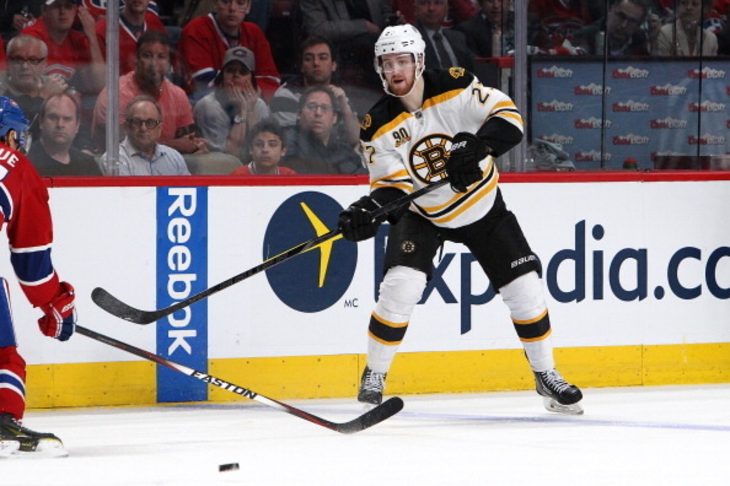 MONTREAL, QC - MAY 12: Dougie Hamilton #27 of the Boston Bruins passes the puck against the Montreal Canadiens in Game Six of the Second Round of the 2014 NHL Stanley Cup Playoffs at the Bell Centre on May 12, 2014 in Montreal, Quebec, Canada. (Photo by F