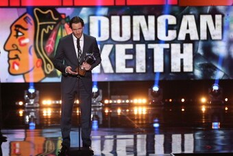 LAS VEGAS, NV - JUNE 24:  Duncan Keith of the Chicago Blackhawks speaks onstage after winning the James Norris Memorial Trophy during the 2014 NHL Awards at the Encore Theater at Wynn Las Vegas on June 24, 2014 in Las Vegas, Nevada.  (Photo by Andre Ringu