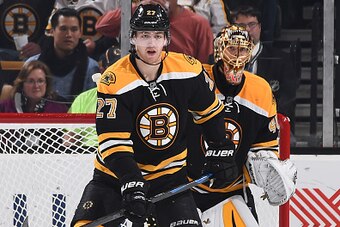 BOSTON, MA - NOVEMBER 4: Dougie Hamilton #27 and Tuukka Rask #40 of the Boston Bruins watch the play against the Florida Panthers at the TD Garden on November 4, 2014 in Boston, Massachusetts.  (Photo by Steve Babineau/NHLI via Getty Images)