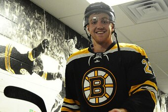 BOSTON, MA - NOVEMBER 6 : Dougie Hamilton #27 of the Boston Bruins walks to the locker room after warm ups before the game against the Edmonton Oilers at the TD Garden on November 6, 2014 in Boston, Massachusetts.  (Photo by Steve Babineau/NHLI via Getty 