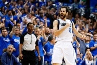 May 2, 2014; Dallas, TX, USA; Dallas Mavericks guard Jose Calderon (8) reacts after hitting a three point shot during the game against the San Antonio Spurs in game six of the first round of the 2014 NBA Playoffs at American Airlines Center. Mandatory Cre