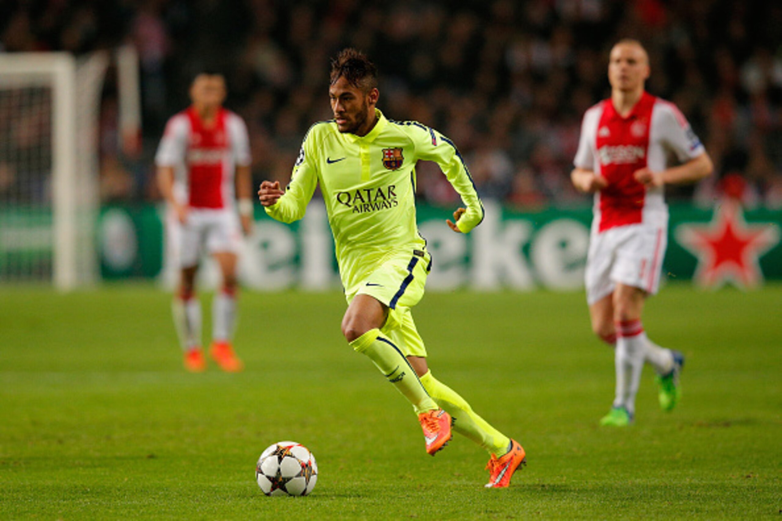 AMSTERDAM, NETHERLANDS - NOVEMBER 05:  Neymar of Barcelona breaks with the ball during the UEFA Champions League Group F match between AFC Ajax and FC Barcelona at The Amsterdam Arena on November 5, 2014 in Amsterdam, Netherlands.  (Photo by Dean Mouhtaro