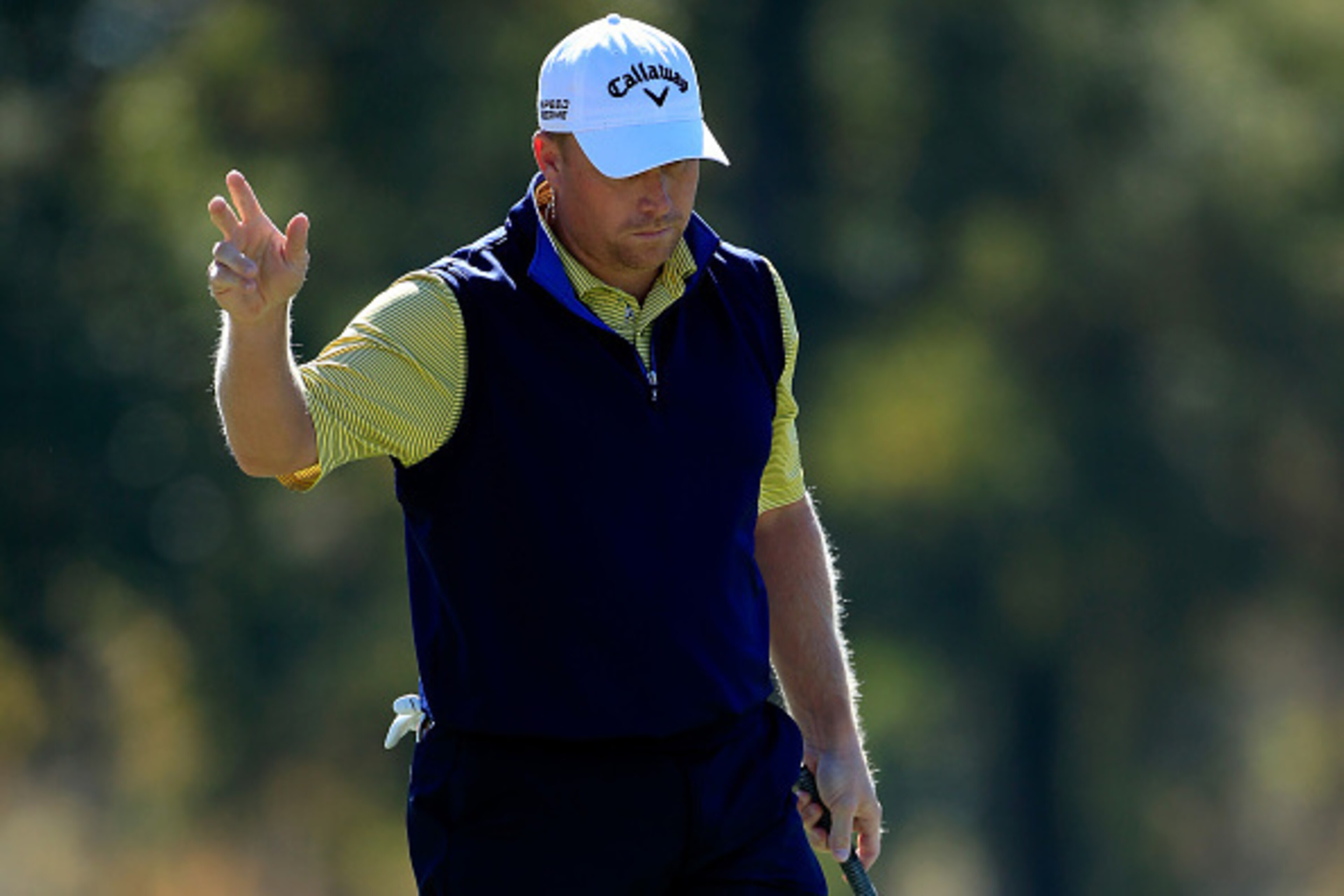 JACKSON, MS - NOVEMBER 08: John Rollins of the United States acknowledges the crowd after making his birdie putt on the third hole during Round Three of the Sanderson Farms Championship at The Country Club of Jackson on November 8, 2014 in Jackson, Missis