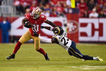 SANTA CLARA, CA - NOVEMBER 02: Anquan Boldin #81 of the San Francisco 49ers rushes past Rodney McLeod #23 of the St. Louis Rams during the fourth quarter at Levi's Stadium on November 2, 2014 in Santa Clara, California.  The St. Louis Rams defeated the Sa