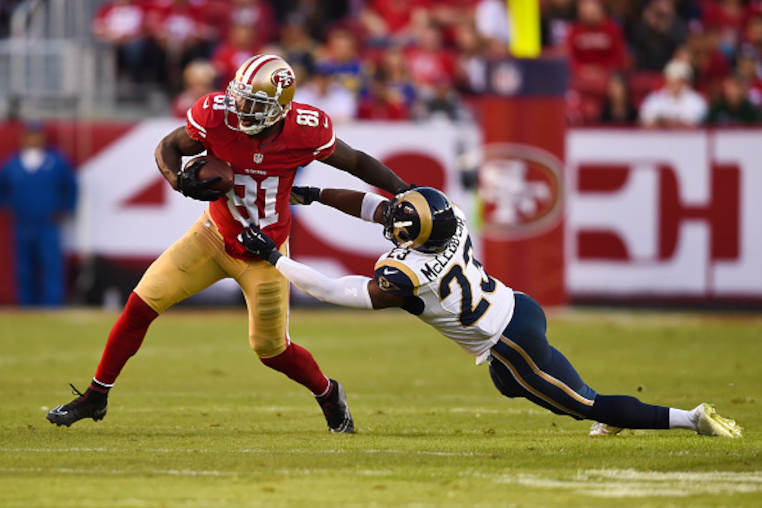 SANTA CLARA, CA - NOVEMBER 02: Anquan Boldin #81 of the San Francisco 49ers rushes past Rodney McLeod #23 of the St. Louis Rams during the fourth quarter at Levi's Stadium on November 2, 2014 in Santa Clara, California.  The St. Louis Rams defeated the Sa