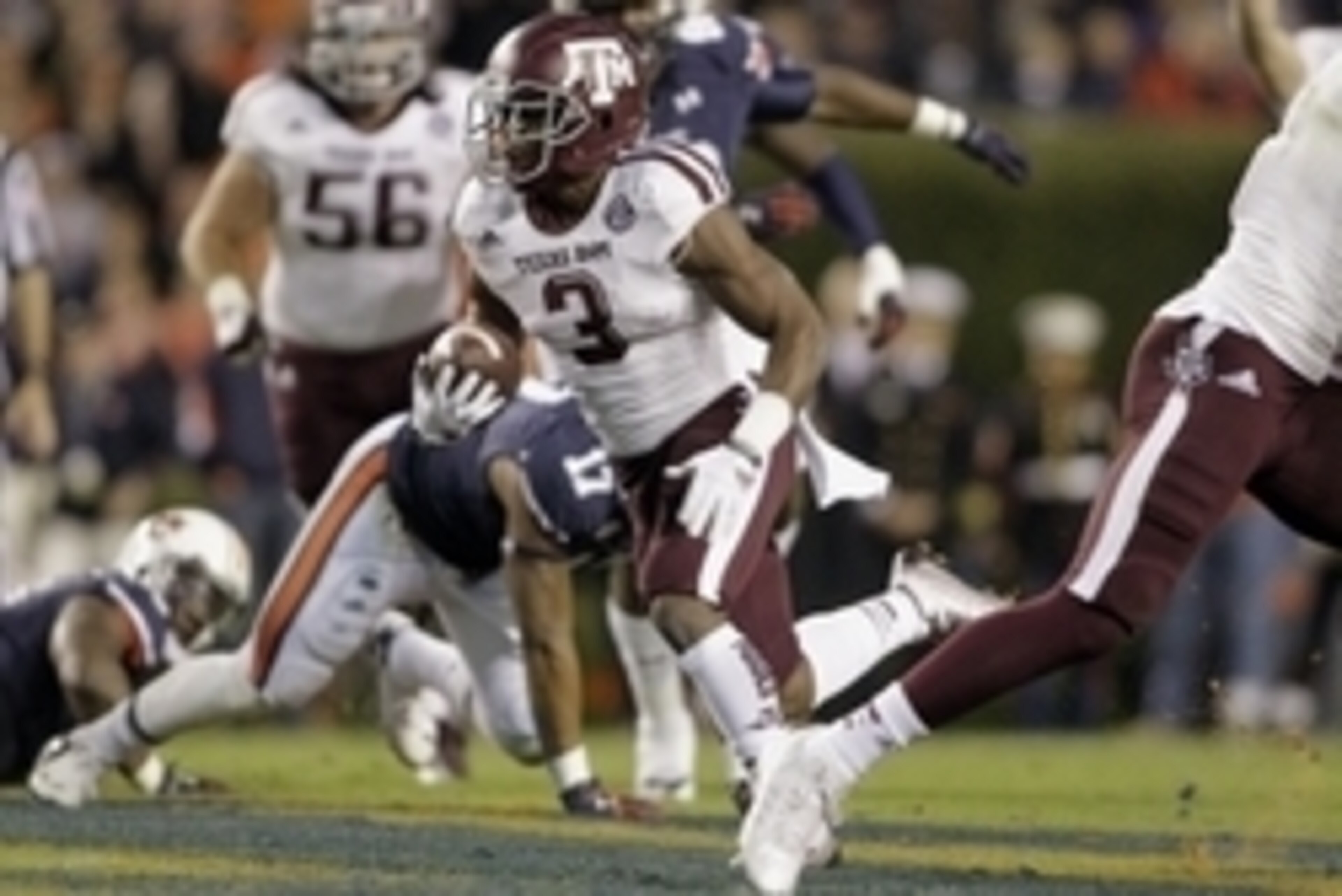 Nov 8, 2014; Auburn, AL, USA; Texas A&M running back Trey Williams (3) carries against the Auburn Tigers during the second half at Jordan Hare Stadium  The Aggies beat the Tigers 41-38. Mandatory Credit: John Reed-USA TODAY Sports