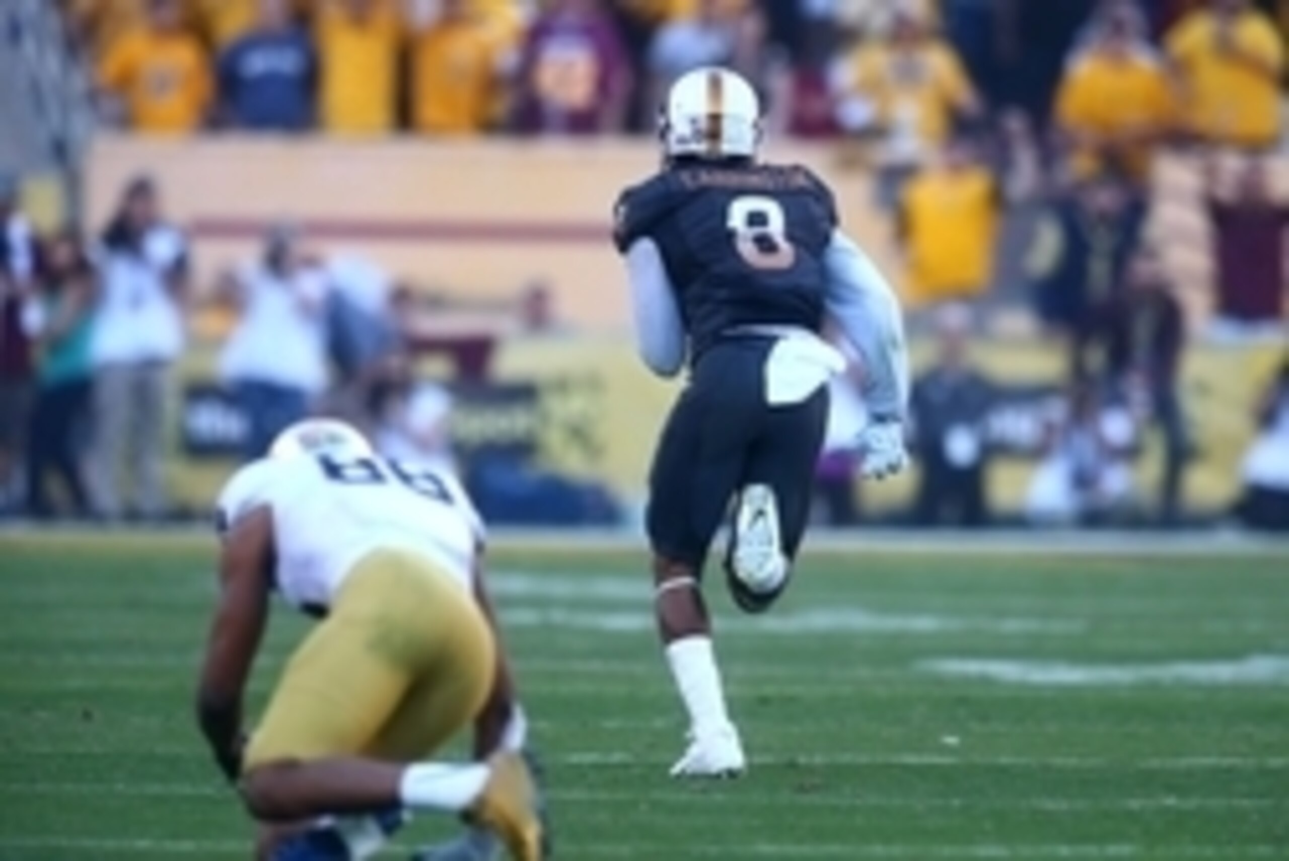 Nov 8, 2014; Tempe, AZ, USA; Arizona State Sun Devils defensive back Lloyd Carrington (8) returns an interception for a touchdown against the Notre Dame Fighting Irish in the fourth quarter at Sun Devil Stadium. Arizona State defeated Notre Dame 55-31. Ma Nov 8, 2014; Tempe, AZ, USA; Arizona State Sun Devils defensive back Lloyd Carrington (8) returns an interception for a touchdown against the Notre Dame Fighting Irish in the fourth quarter at Sun Devil Stadium. Arizona State defeated Notre Dame 55-31. Ma