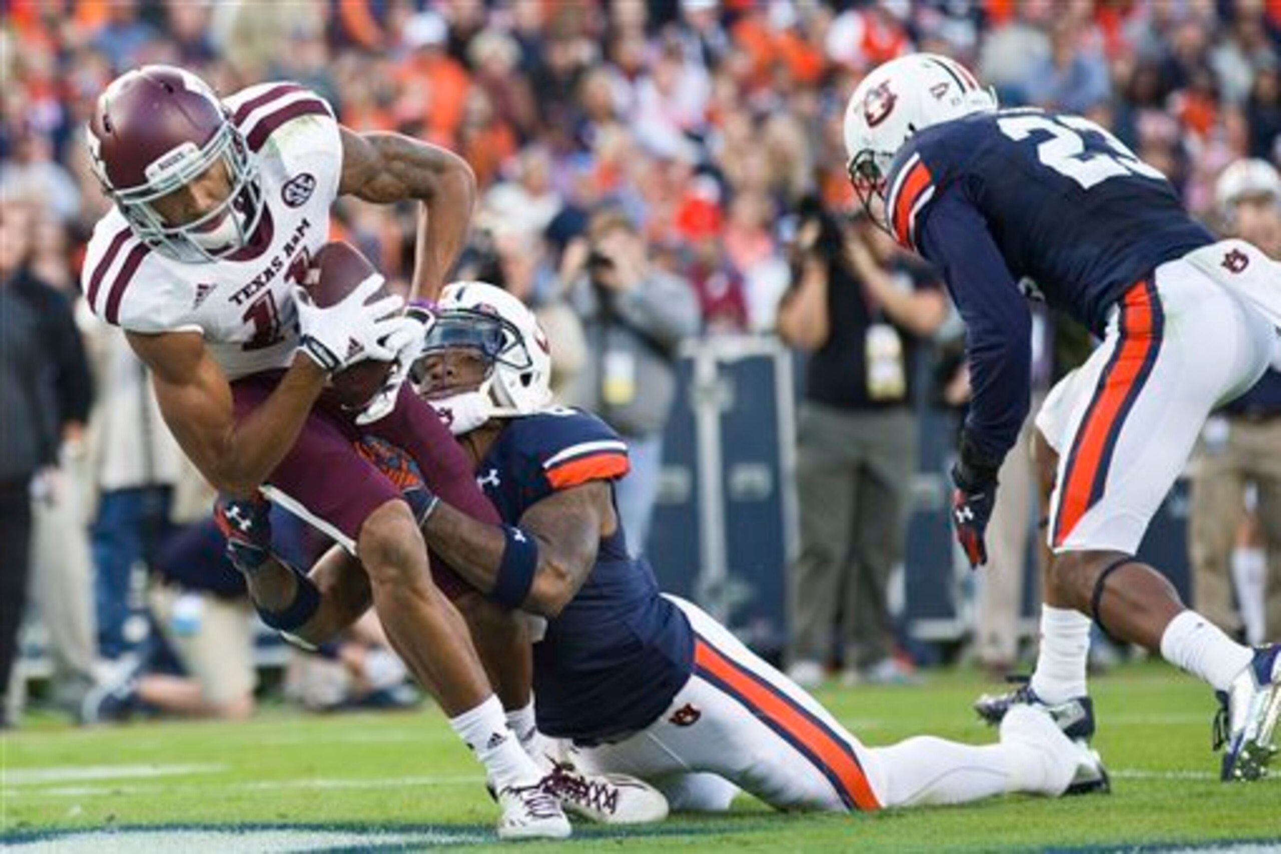 Texas A&M WR Josh Reynolds, Auburn CB Jonathon Mincy and Auburn S Johnathan Ford Texas A&M WR Josh Reynolds, Auburn CB Jonathon Mincy and Auburn S Johnathan Ford