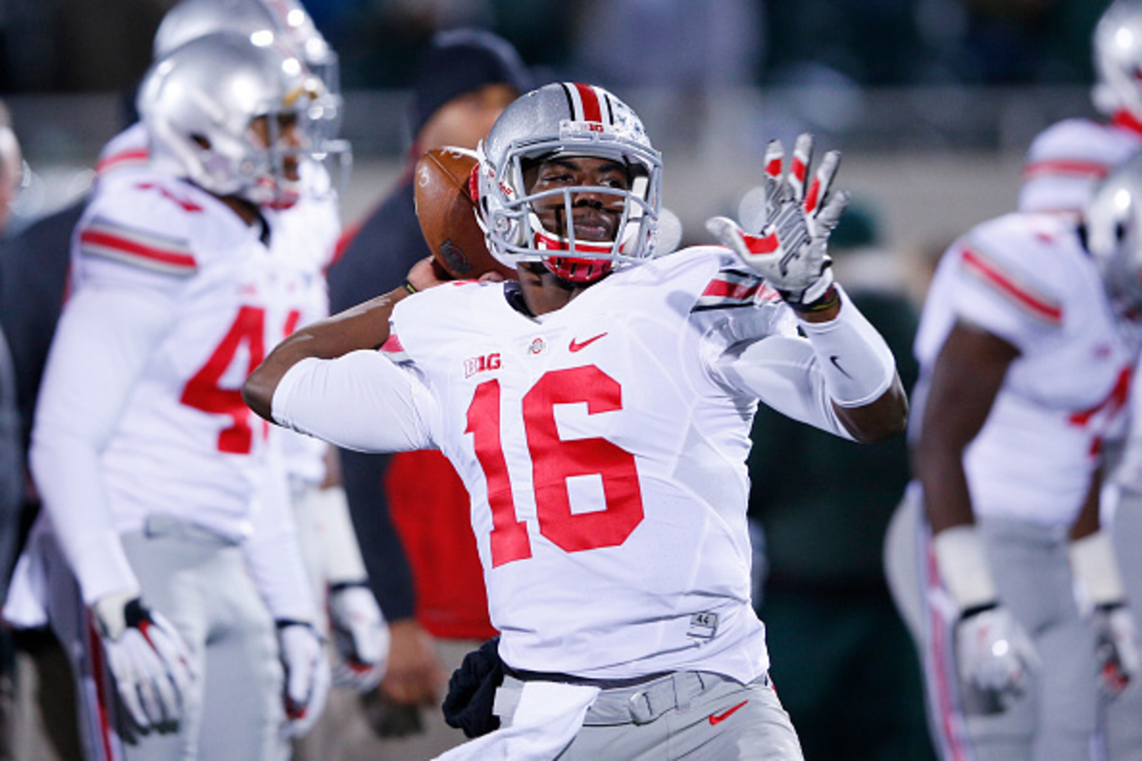 EAST LANSING, MI - NOVEMBER 8: J.T. Barrett #16 of the Ohio State Buckeyes warms up before the game against the Michigan State Spartans at Spartan Stadium on November 8, 2014 in East Lansing, Michigan. (Photo by Joe Robbins/Getty Images)