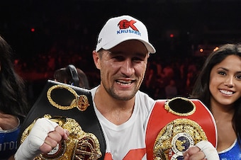 ATLANTIC CITY, NJ - NOVEMBER 08:  Sergey Kovalev celebrates his unanimous decision win against  Bernard Hopkins after their IBF, WBA, & WBO Light Heavyweight title fight at Boardwalk Hall Arena on November 8, 2014 in Atlantic City, New Jersey.  (Photo by 