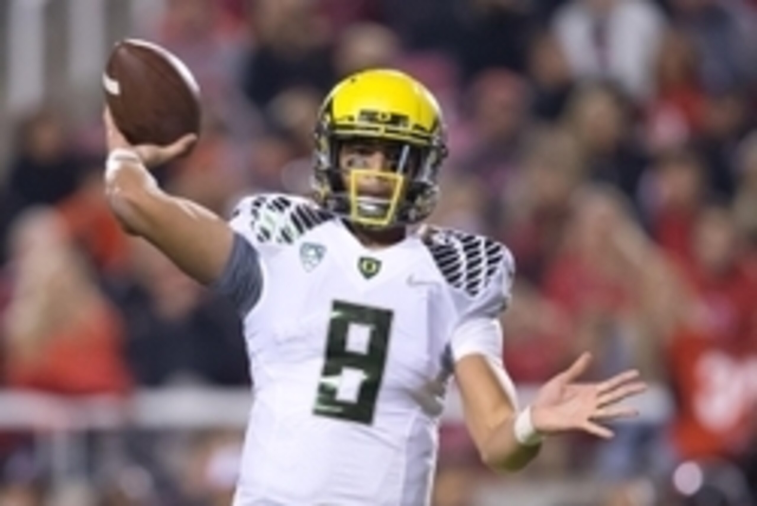 Nov 8, 2014; Salt Lake City, UT, USA; Oregon Ducks quarterback Marcus Mariota (8) passes the ball during the first half against the Utah Utes at Rice-Eccles Stadium. Mandatory Credit: Russ Isabella-USA TODAY Sports Nov 8, 2014; Salt Lake City, UT, USA; Oregon Ducks quarterback Marcus Mariota (8) passes the ball during the first half against the Utah Utes at Rice-Eccles Stadium. Mandatory Credit: Russ Isabella-USA TODAY Sports