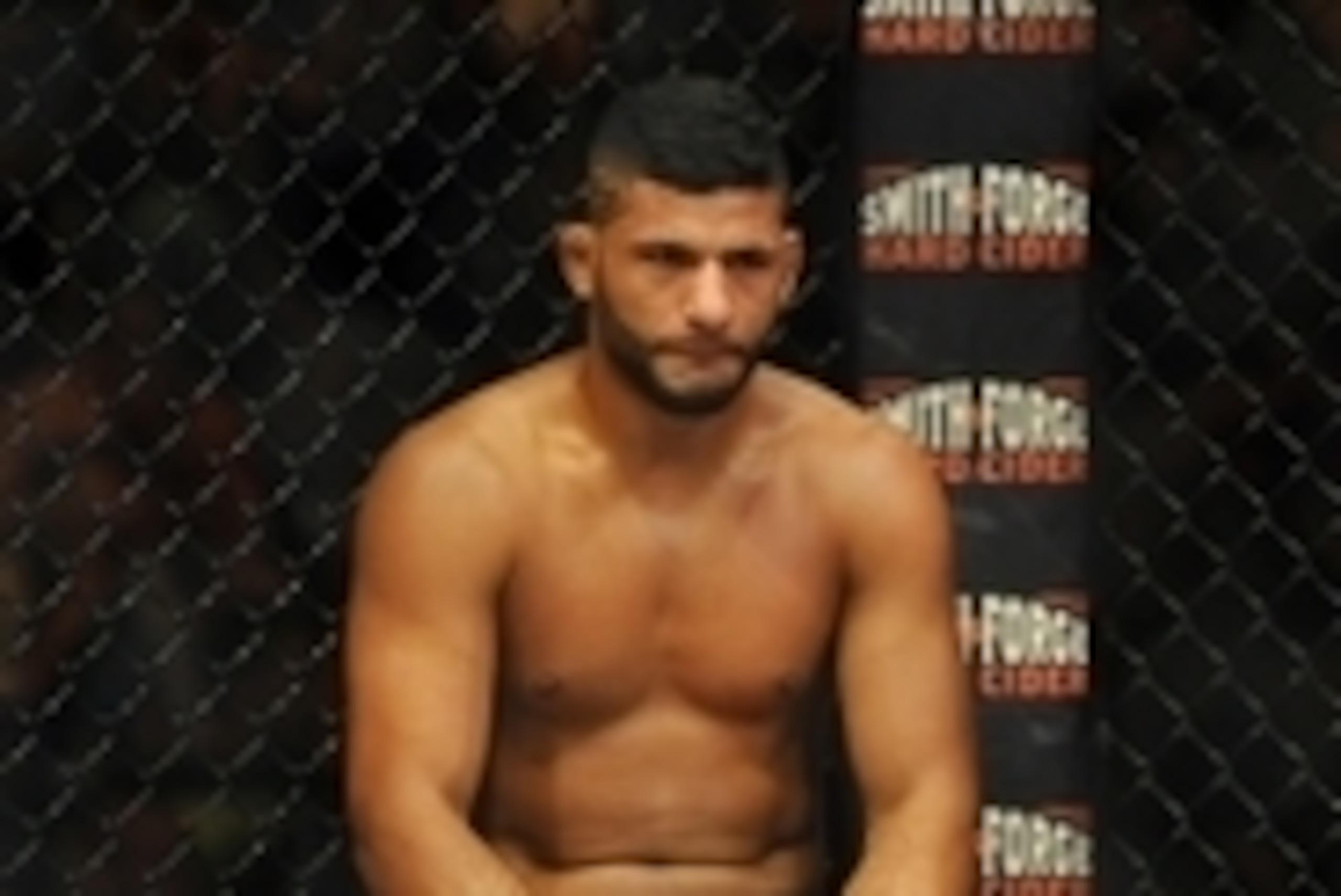 Jul 6, 2014; Las Vegas, NV, USA; Dhiego Lima sits in defeat after a knockout loss by Eddie Gordon (not pictured) during the first round of an Ultimate Fighter middleweight title fight at Mandalay Bay Events Center. Mandatory Credit: Stephen R. Sylvanie-US