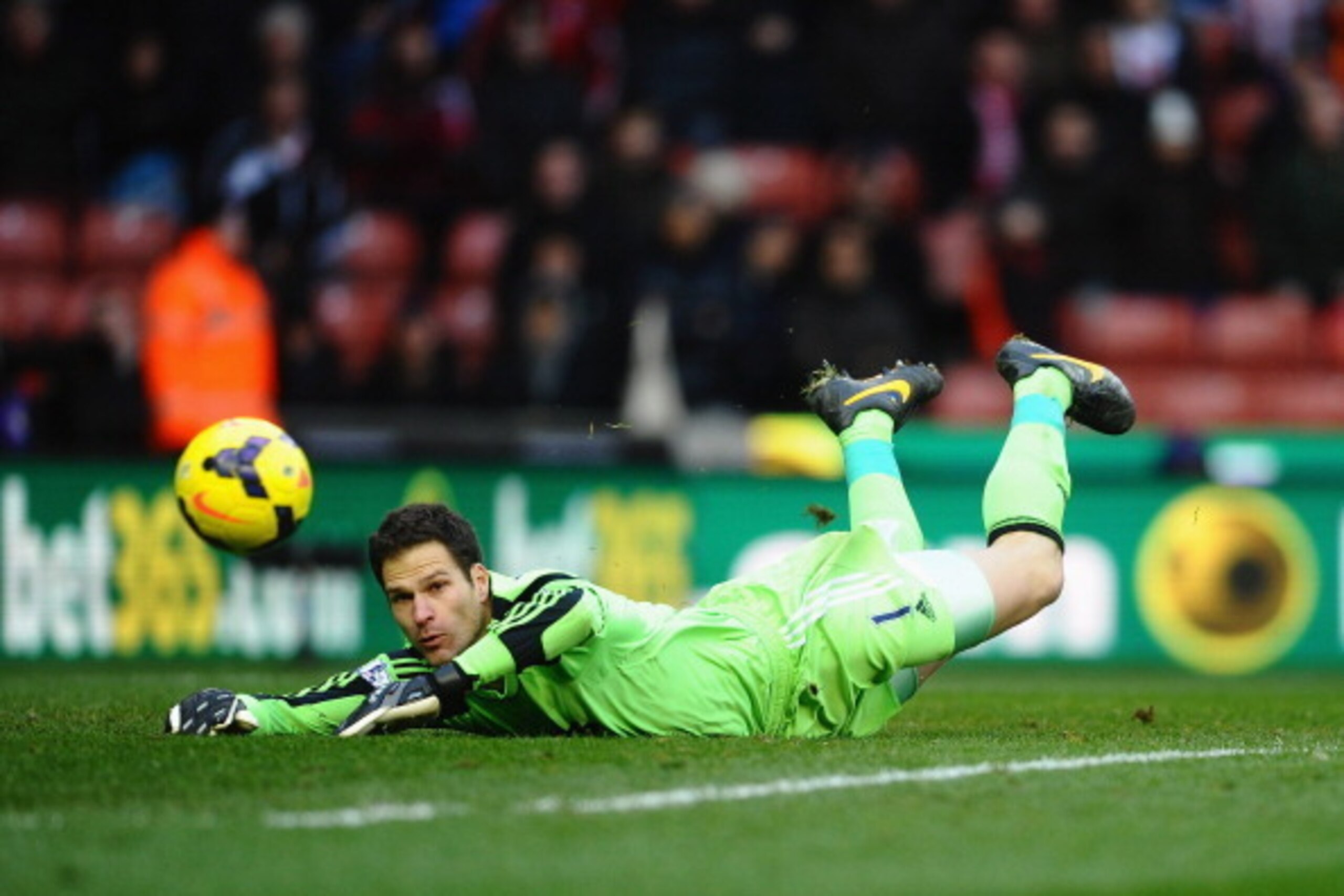 STOKE ON TRENT, ENGLAND - FEBRUARY 01: Asmir Begovic of Stoke City makes a diving save during the Barclays premier League match between Stoke City and Manchester United at Britannia Stadium on February 1, 2014 in Stoke on Trent, England.  (Photo by Lauren
