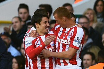 LONDON, ENGLAND - NOVEMBER 09:  Bojan Krkic (L) of Stoke City celebrates with teammate Steve Sidwell of Stoke City after scoring the opening goal during the Barclays Premier League match between Tottenham Hotspur and Stoke City at White Hart Lane on Novem