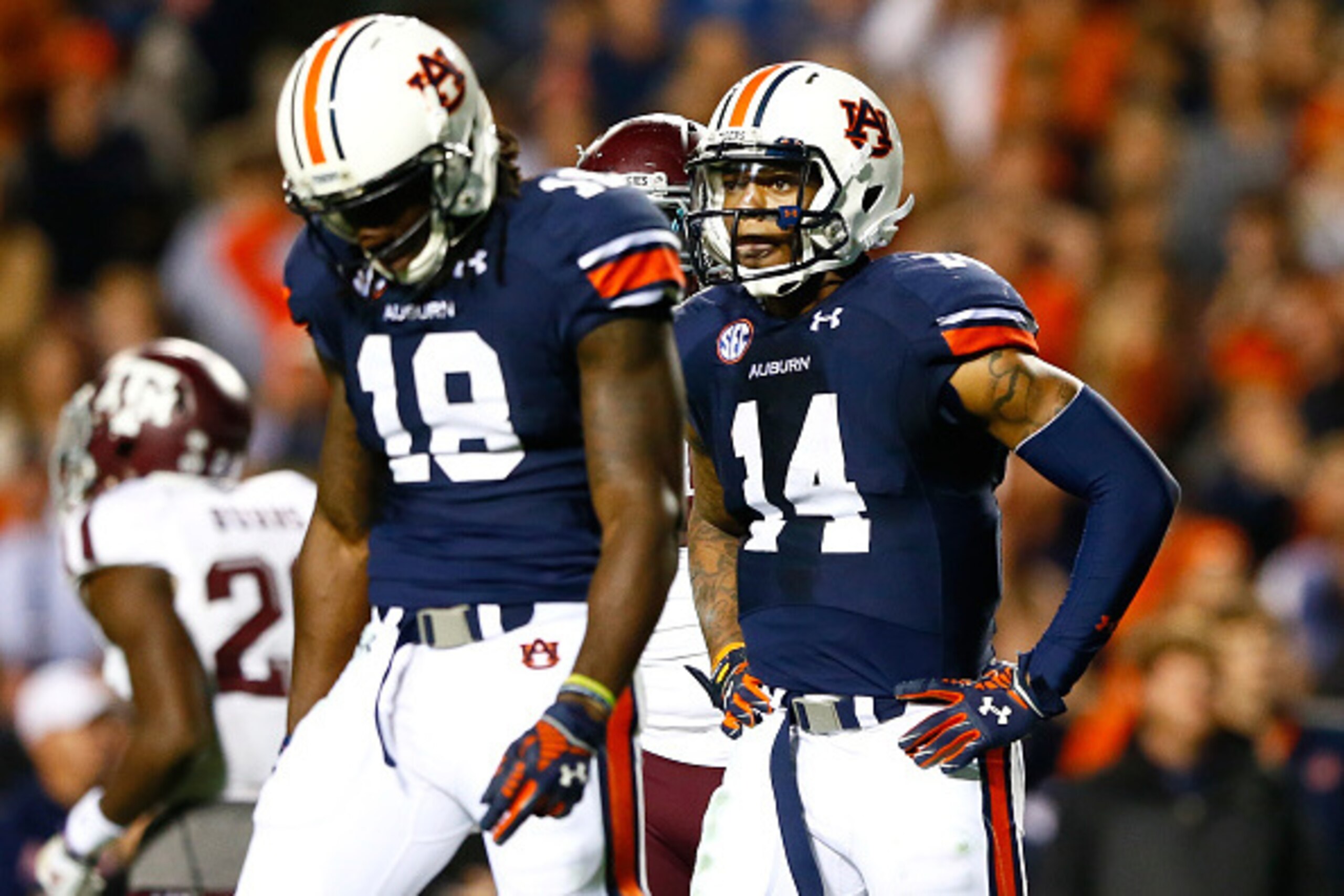 AUBURN, AL - NOVEMBER 08: Nick Marshall #14 of the Auburn Tigers walks off the field after fumbling to the Texas A&M Aggies on the two-yard line in just under the last three minutes of their 41-38 loss at Jordan Hare Stadium on November 8, 2014 in Auburn AUBURN, AL - NOVEMBER 08: Nick Marshall #14 of the Auburn Tigers walks off the field after fumbling to the Texas A&M Aggies on the two-yard line in just under the last three minutes of their 41-38 loss at Jordan Hare Stadium on November 8, 2014 in Auburn