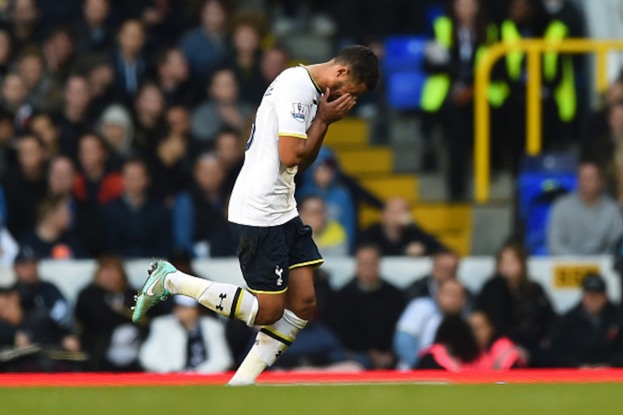 LONDON, ENGLAND - NOVEMBER 09:  Kyle Naughton of Spurs reacts as he leaves the field after being shown the red card during the Barclays Premier League match between Tottenham Hotspur and Stoke City at White Hart Lane on November 9, 2014 in London, England