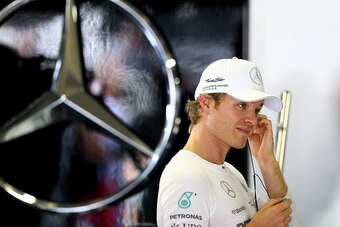 SAO PAULO, BRAZIL - NOVEMBER 09:  Nico Rosberg of Germany and Mercedes GP prepares in the garage before the Brazilian Formula One Grand Prix at Autodromo Jose Carlos Pace on November 9, 2014 in Sao Paulo, Brazil.  (Photo by Clive Mason/Getty Images)