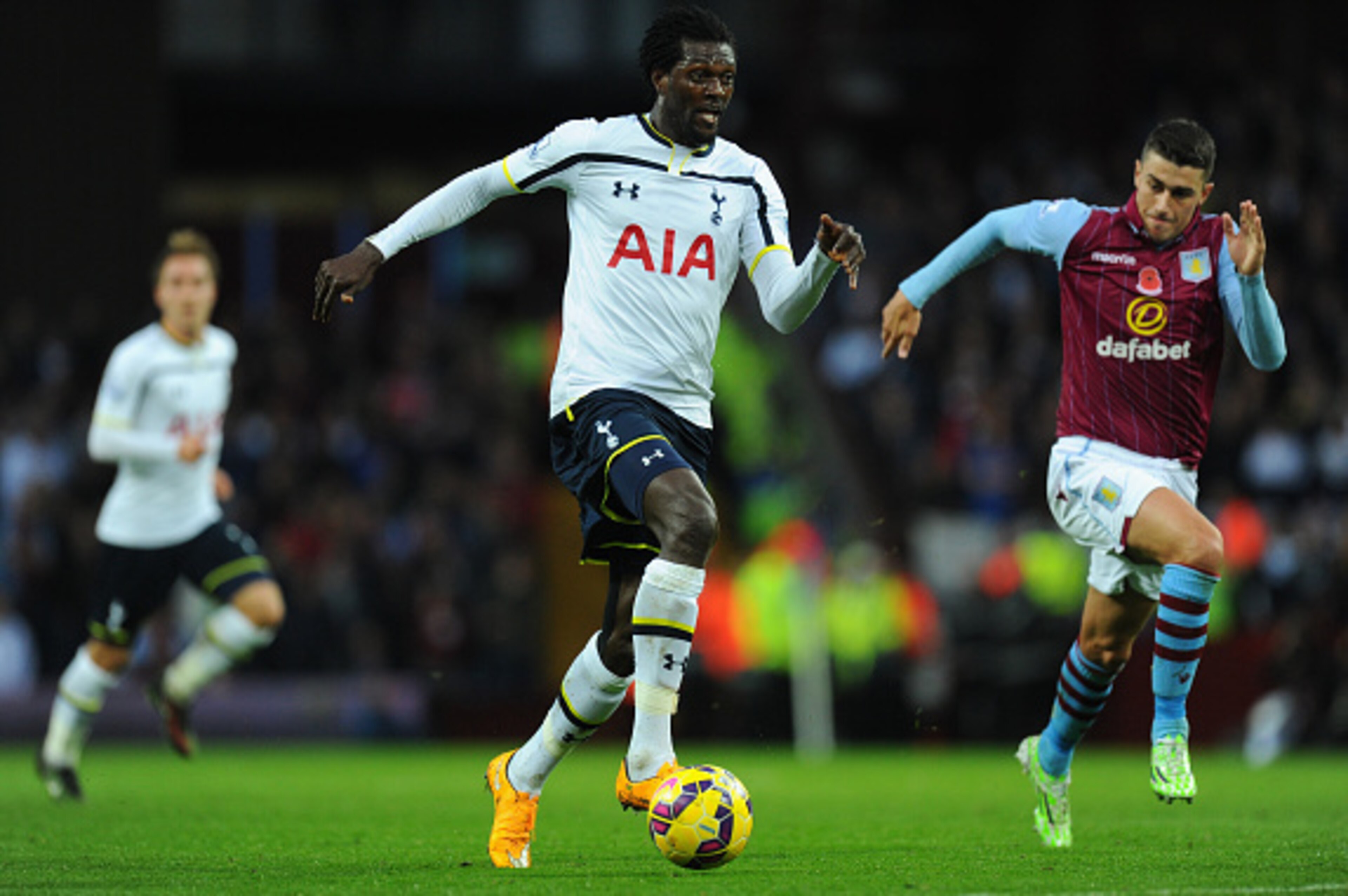 BIRMINGHAM, ENGLAND - NOVEMBER 02:  Spurs striker Emmanuel Adebayor (c) closes in on goal during the Barclays Premier League match between Aston Villa and Tottenham Hotspur at Villa Park on November 2, 2014 in Birmingham, England.  (Photo by Stu Forster/G