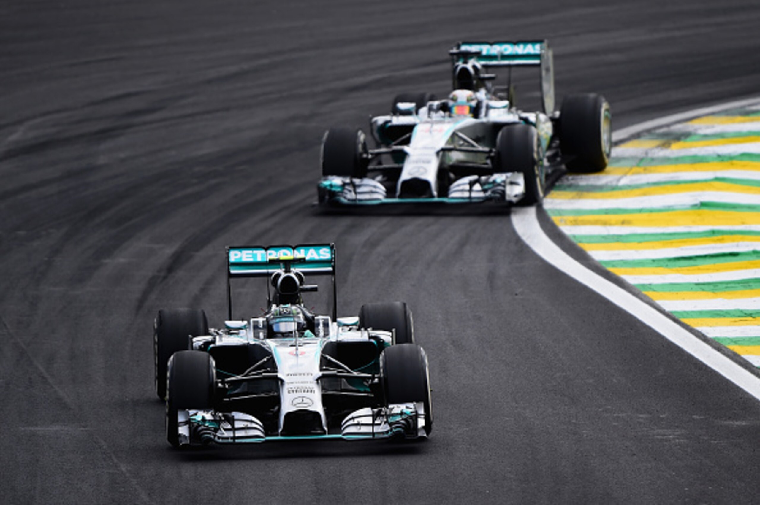 SAO PAULO, BRAZIL - NOVEMBER 09: Nico Rosberg of Germany and Mercedes GP leads Lewis Hamilton of Great Britain and Mercedes GP during the Brazilian Formula One Grand Prix at Autodromo Jose Carlos Pace on November 9, 2014 in Sao Paulo, Brazil. (Photo by SAO PAULO, BRAZIL - NOVEMBER 09: Nico Rosberg of Germany and Mercedes GP leads Lewis Hamilton of Great Britain and Mercedes GP during the Brazilian Formula One Grand Prix at Autodromo Jose Carlos Pace on November 9, 2014 in Sao Paulo, Brazil. (Photo by
