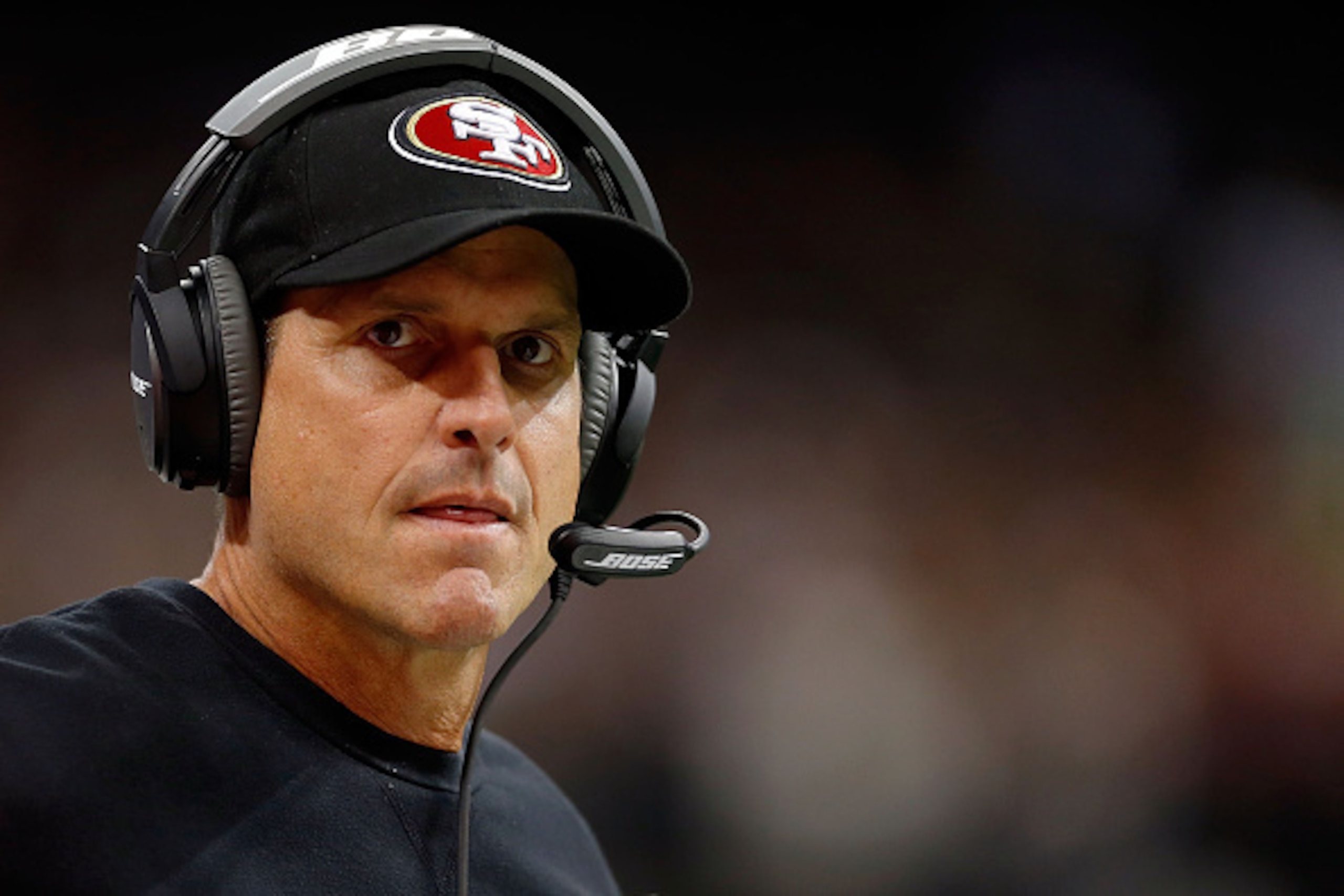 NEW ORLEANS, LA - NOVEMBER 09:  Head coach Jim Harbaugh of the San Francisco 49ers watches action during the fourth quarter of a game against the New Orleans Saints at the Mercedes-Benz Superdome on November 9, 2014 in New Orleans, Louisiana.  (Photo by W