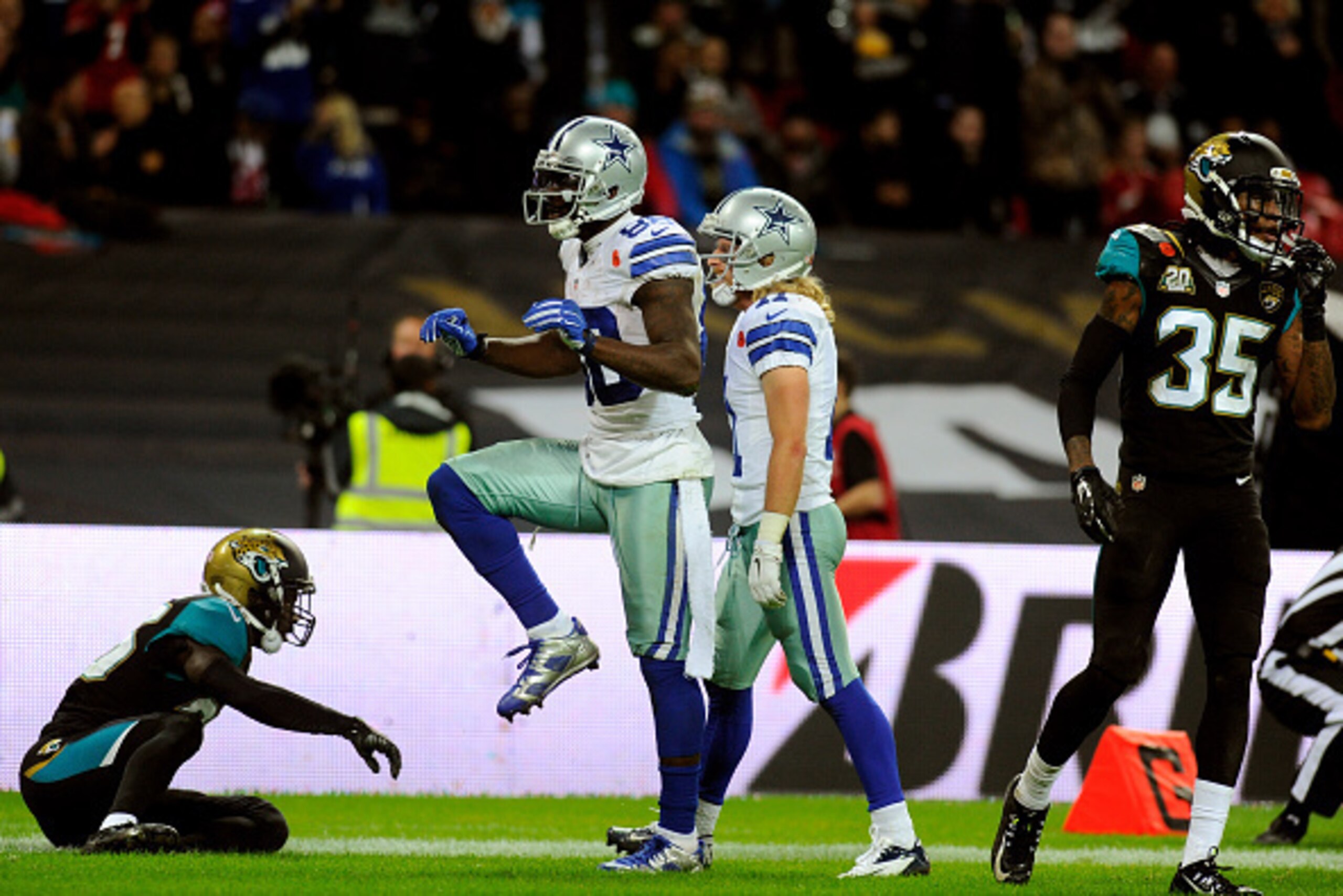 LONDON, ENGLAND - NOVEMBER 09: Dez Bryant #88 of the Dallas Cowboys celebrates after scoring a touchdown during the NFL week 10 match between the Jackson Jaguars and the Dallas Cowboys at Wembley Stadium on November 9, 2014 in London, England. (Photo by LONDON, ENGLAND - NOVEMBER 09: Dez Bryant #88 of the Dallas Cowboys celebrates after scoring a touchdown during the NFL week 10 match between the Jackson Jaguars and the Dallas Cowboys at Wembley Stadium on November 9, 2014 in London, England. (Photo by