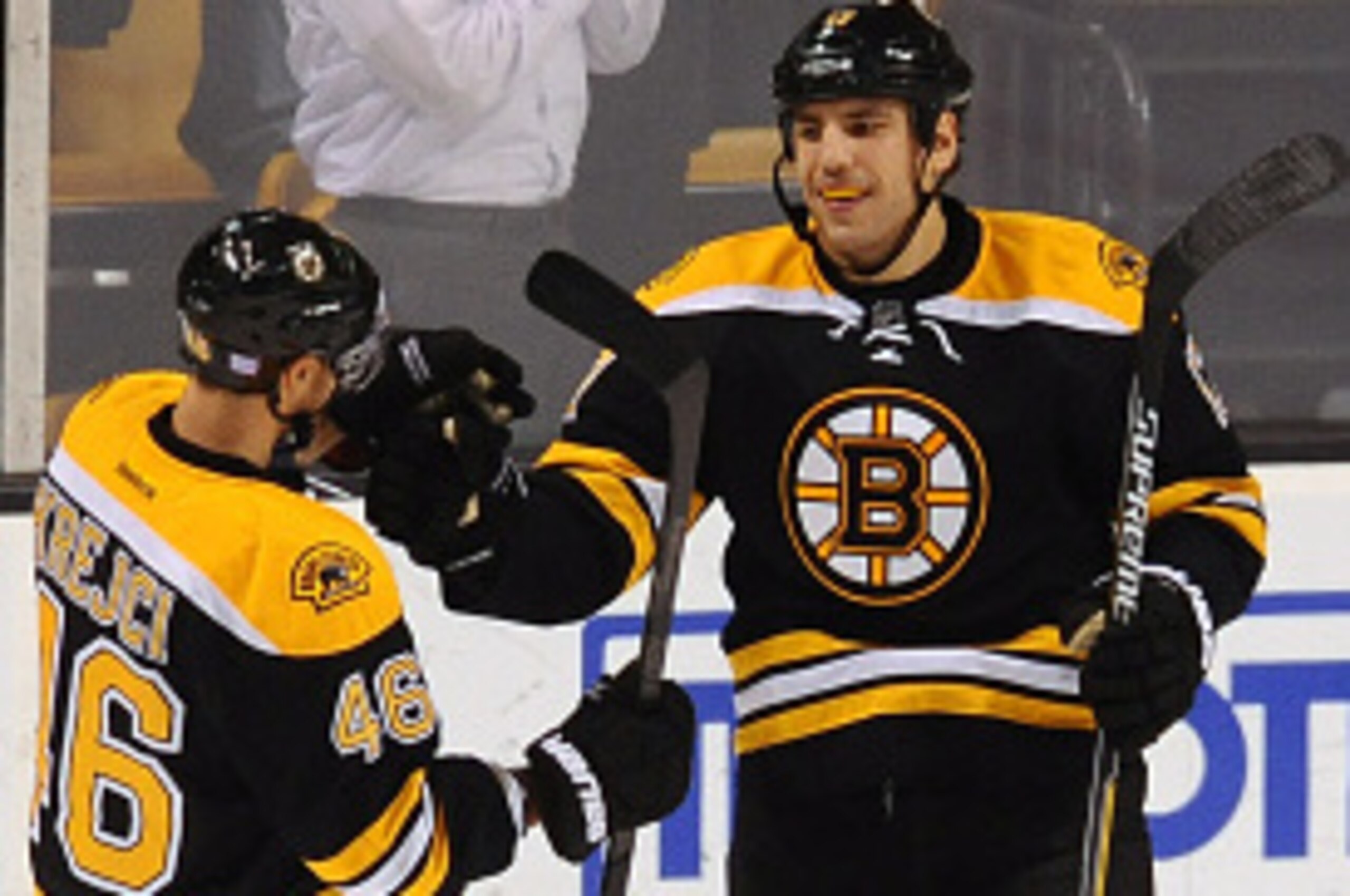BOSTON, MA - NOVEMBER 6 : David Krejci #46, Milan Lucic #17 and Brad Marchand #63 of the Boston Bruins celebrate an open net goal against the Edmonton Oilers at the TD Garden on November 6, 2014 in Boston, Massachusetts.  (Photo by Steve Babineau/NHLI via