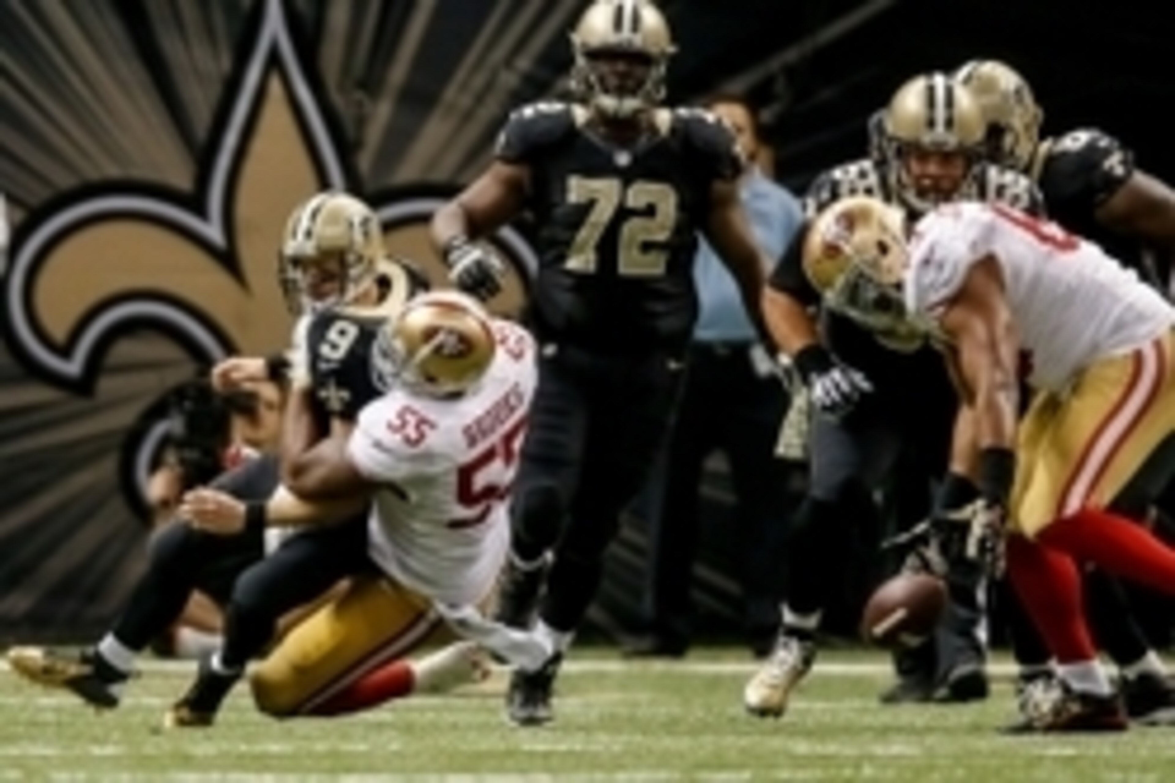 Nov 9, 2014; New Orleans, LA, USA; San Francisco 49ers outside linebacker Ahmad Brooks (55) sacks New Orleans Saints quarterback Drew Brees (9) in overtime at Mercedes-Benz Superdome. The 49ers won 27-24 in overtime. Mandatory Credit: Derick E. Hingle-USA