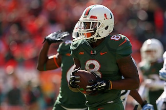 MIAMI GARDENS, FL - NOVEMBER 01:  Duke Johnson #8 of the Miami Hurricanes celebrates a touchdown during a game against the North Carolina Tar Heels at Sun Life Stadium on November 1, 2014 in Miami Gardens, Florida.  (Photo by Mike Ehrmann/Getty Images)
