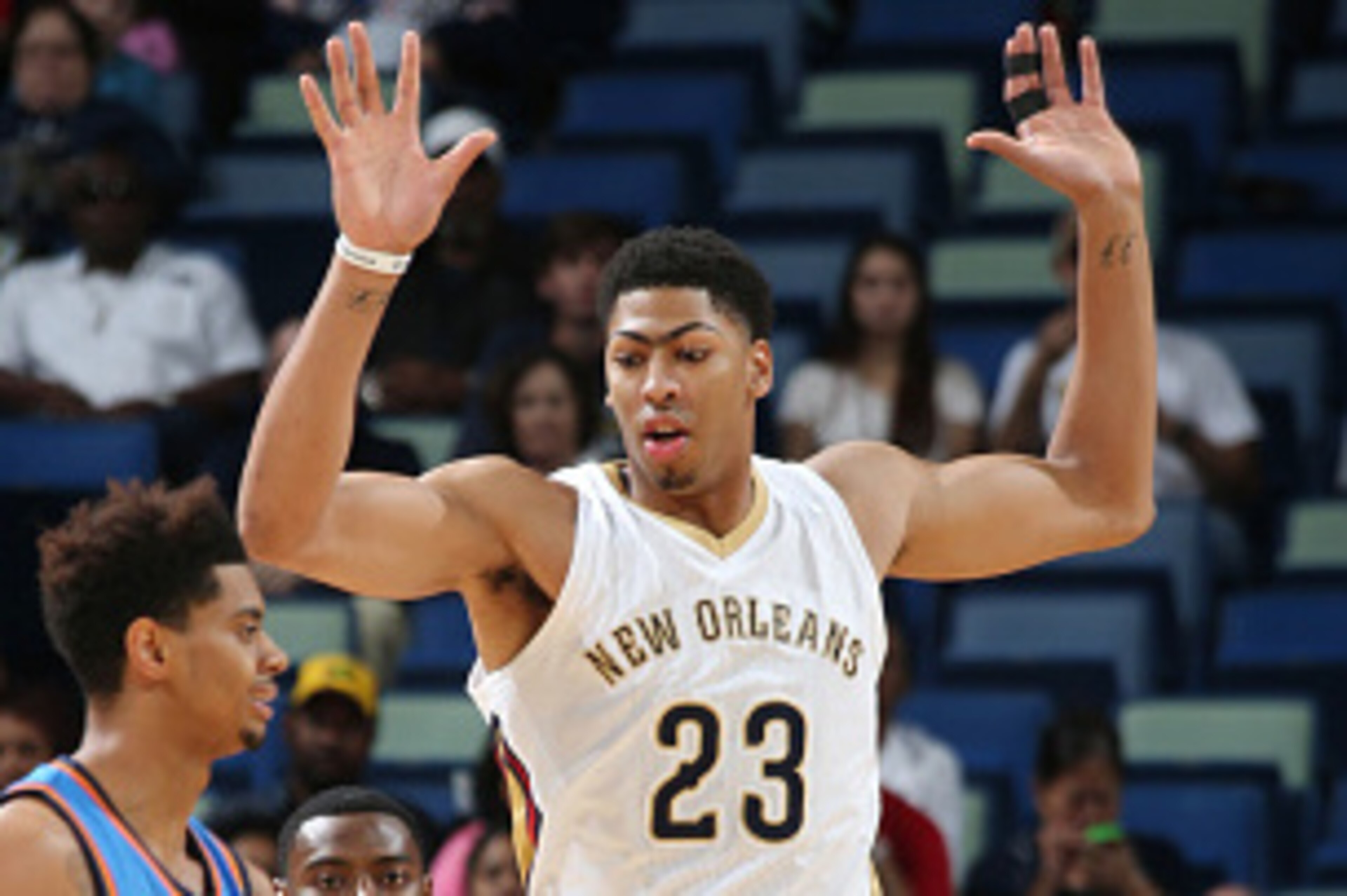 NEW ORLEANS, LA - OCTOBER 16: Jeremy Lamb #11 of the Oklahoma City Thunder handles the ball against Anthony Davis #23 of the New Orleans Pelicans during an NBA game on October 16, 2014 at the Smoothie King Center in New Orleans, Louisiana. NOTE TO USER: U