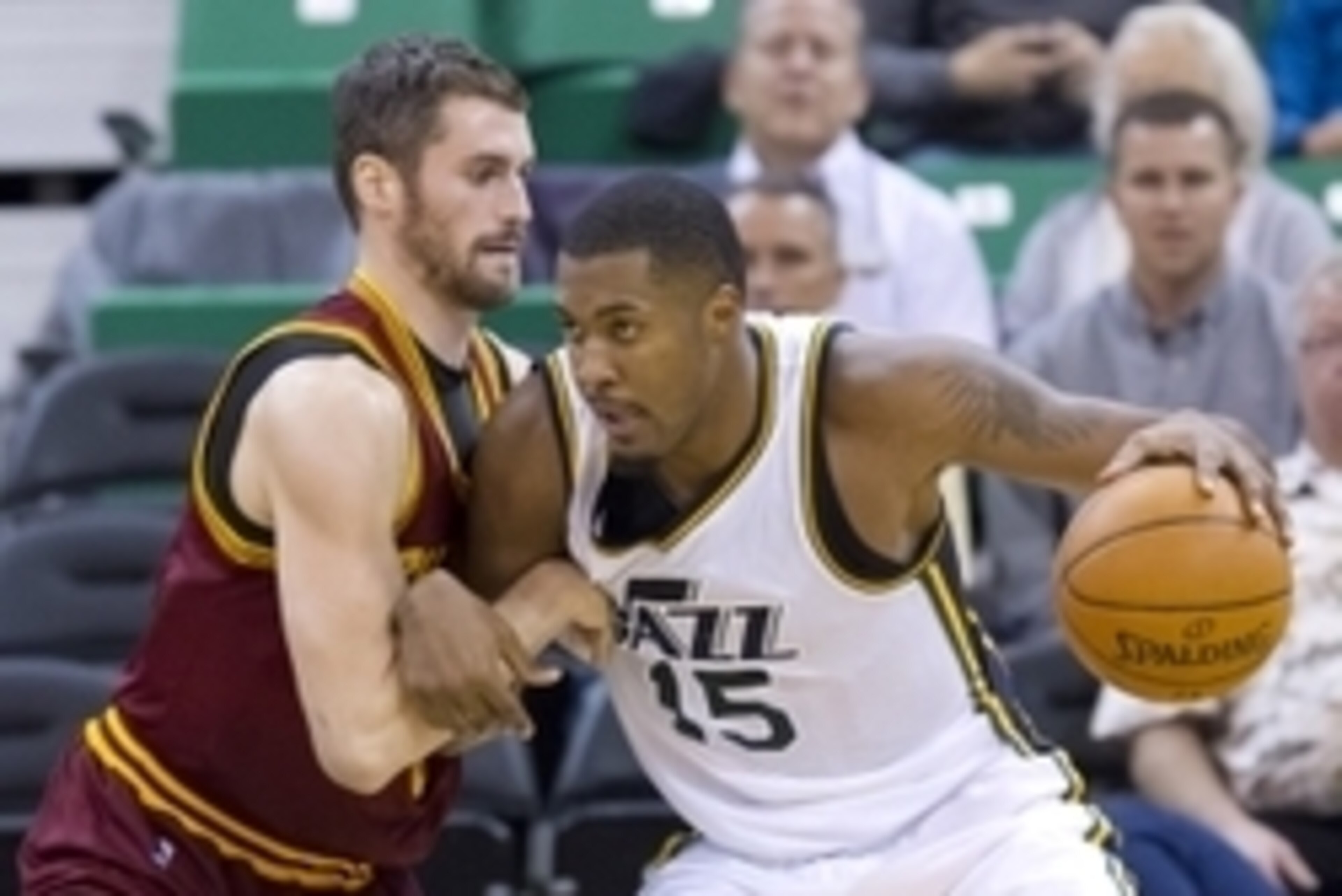 Nov 5, 2014; Salt Lake City, UT, USA; Cleveland Cavaliers forward Kevin Love (0) defends against Utah Jazz center Derrick Favors (15) during the second half at EnergySolutions Arena. The Jazz won 102-100. Mandatory Credit: Russ Isabella-USA TODAY Sports Nov 5, 2014; Salt Lake City, UT, USA; Cleveland Cavaliers forward Kevin Love (0) defends against Utah Jazz center Derrick Favors (15) during the second half at EnergySolutions Arena. The Jazz won 102-100. Mandatory Credit: Russ Isabella-USA TODAY Sports