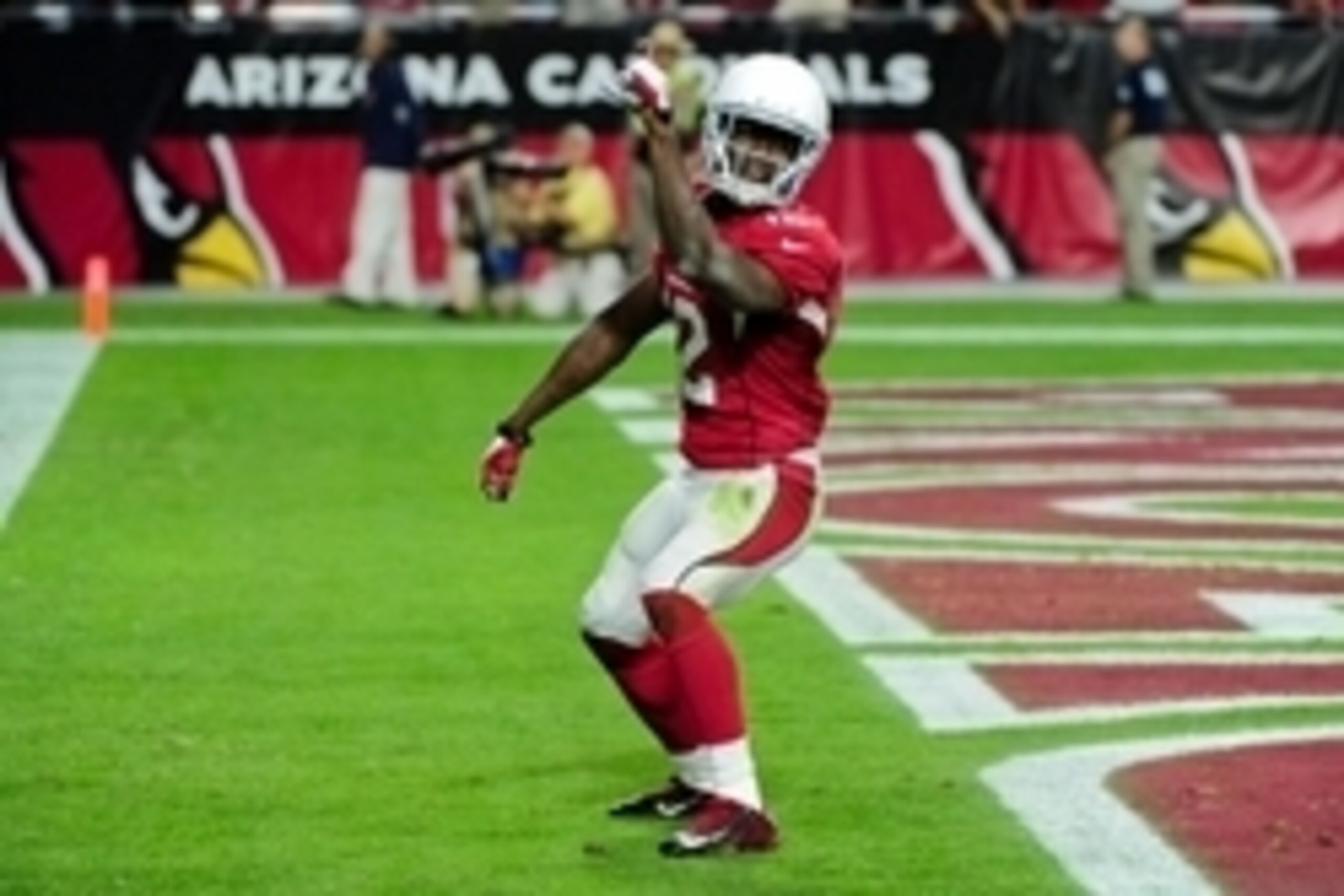 Nov 9, 2014; Glendale, AZ, USA; Arizona Cardinals wide receiver John Brown (12) celebrates after catching a 48 yard touchdown during the second half against the St. Louis Rams at University of Phoenix Stadium. Mandatory Credit: Matt Kartozian-USA TODAY Sp