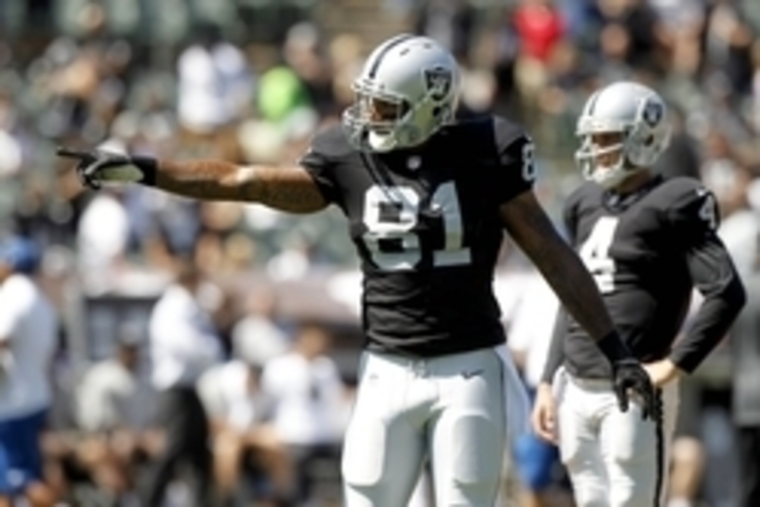 Sep 14, 2014; Oakland, CA, USA; Oakland Raiders tight end Mychal Rivera (81) stands on the field before the start of the game against the Houston Texans at O.co Coliseum. Mandatory Credit: Cary Edmondson-USA TODAY Sports