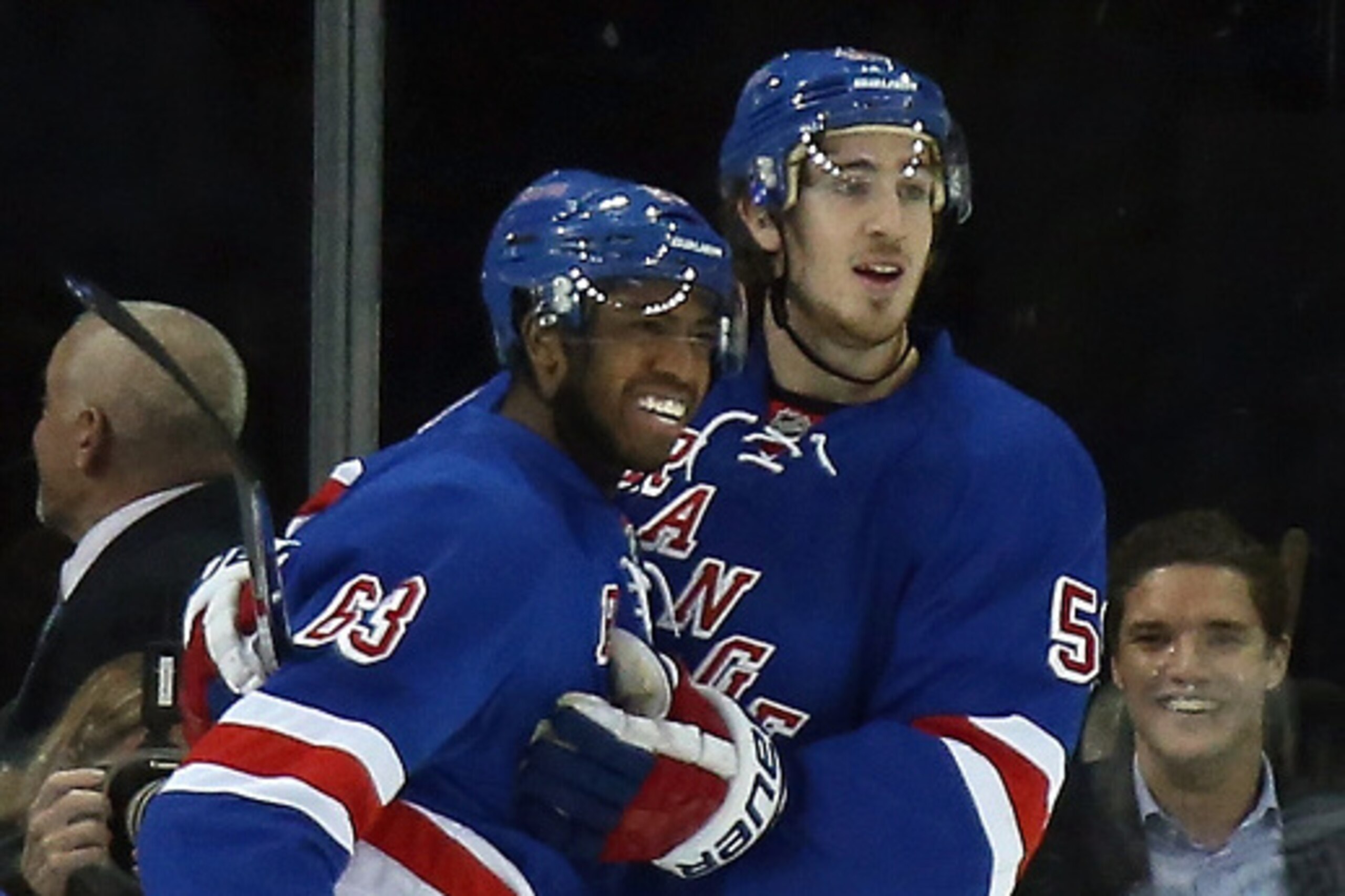 NEW YORK, NY - SEPTEMBER 29: Anthony Duclair #63 (L) of the New York Rangers scores at 5:31 of the first period against the Philadelphia Flyers and is joined by Kevin Hayes #59 (R) at Madison Square Garden on September 29, 2014 in New York City.  (Photo b