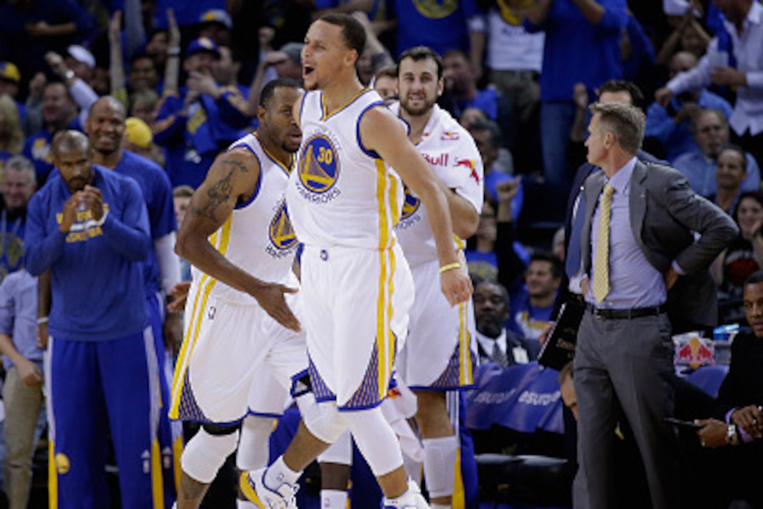 OAKLAND, CA - NOVEMBER 01:  Andre Iguodala #9 and Stephen Curry #30 of the Golden State Warriors react after Iguodala made a dunk against the Los Angeles Lakers at ORACLE Arena on November 1, 2014 in Oakland, California. NOTE TO USER: User expressly ackno