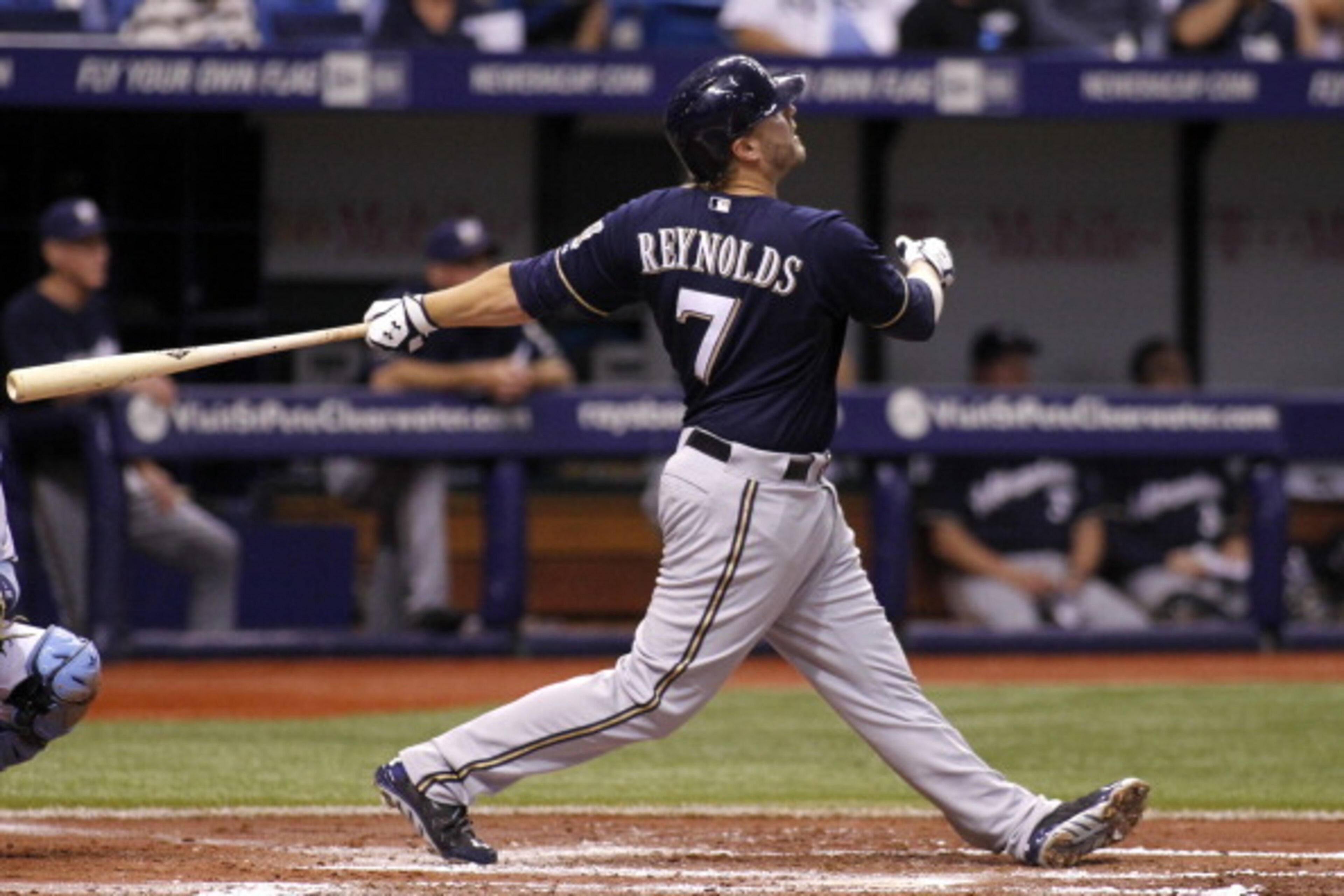 ST. PETERSBURG, FL - JULY 28:  Mark Reynolds #7 of the Milwaukee Brewers hits a solo home run during the third inning of a game against the Tampa Bay Rays on July 28, 2014 at Tropicana Field in St. Petersburg, Florida.  (Photo by Brian Blanco/Getty Images