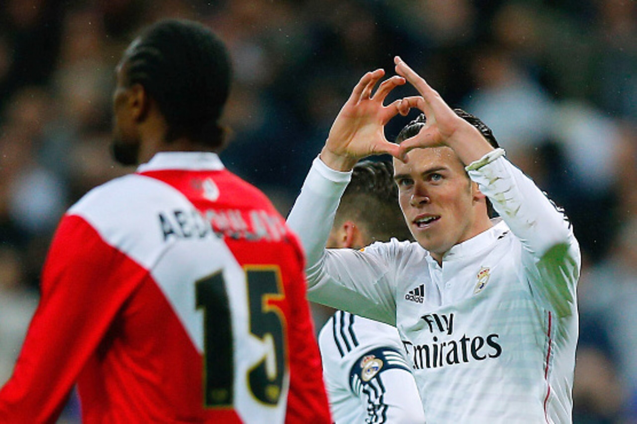 MADRID, SPAIN - NOVEMBER 08: Gareth Bale of Real Madrid CF celebrates scoring their opening goal during the La Liga match between Real Madrid CF and Rayo Vallecano de Madrid at Estadio Santiago Bernabeu on November 8, 2014 in Madrid, Spain.  (Photo by Gon