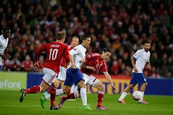 Eriksen in action against Portugal, the performance which prompted Denmark manager Morten Olsen's criticisms of him.