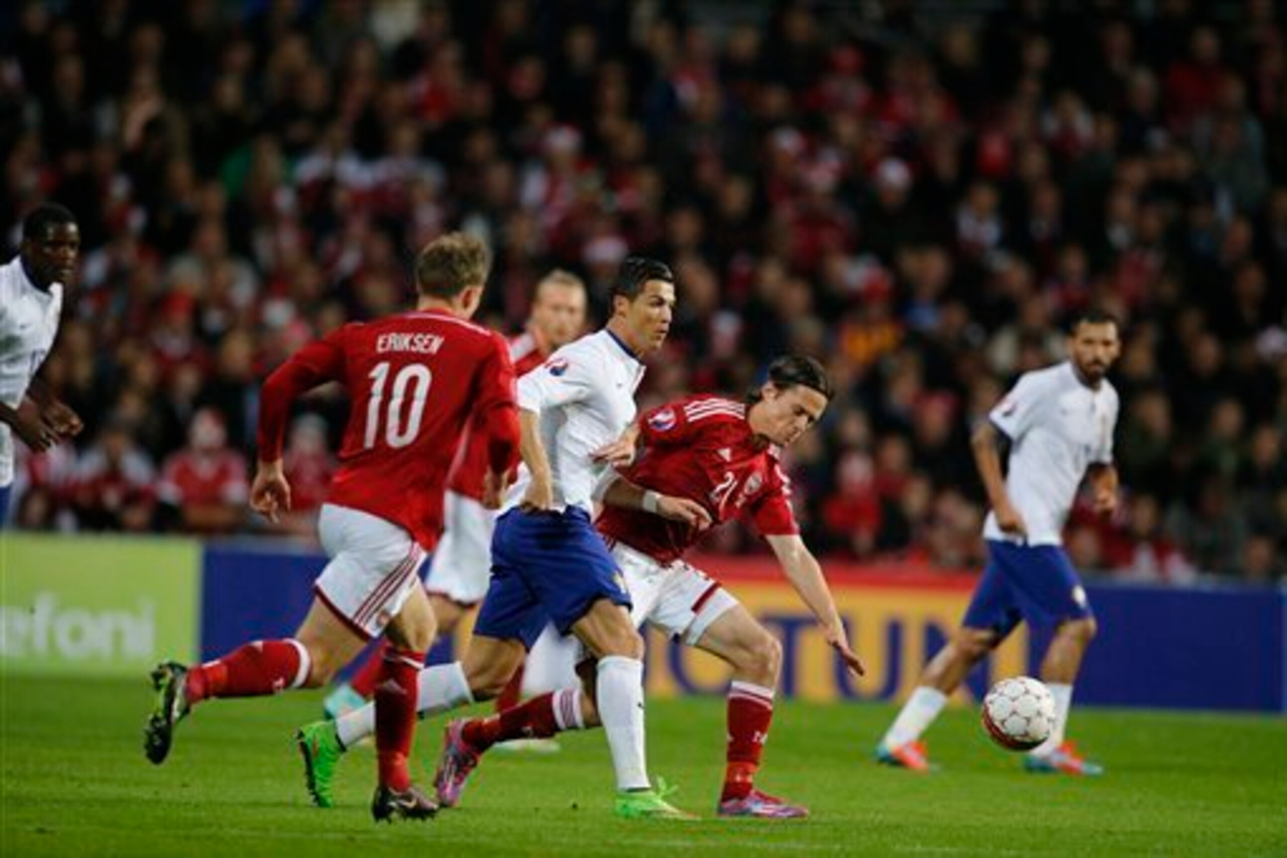 Eriksen in action against Portugal, the performance which prompted Denmark manager Morten Olsen's criticisms of him.