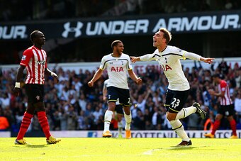 LONDON, ENGLAND - OCTOBER 05:  Christian Eriksen of Spurs celebrates after scoring the opening goal during the Barclays Premier League match between Tottenham Hotspur and Southampton at White Hart Lane on October 5, 2014 in London, England.  (Photo by Ian