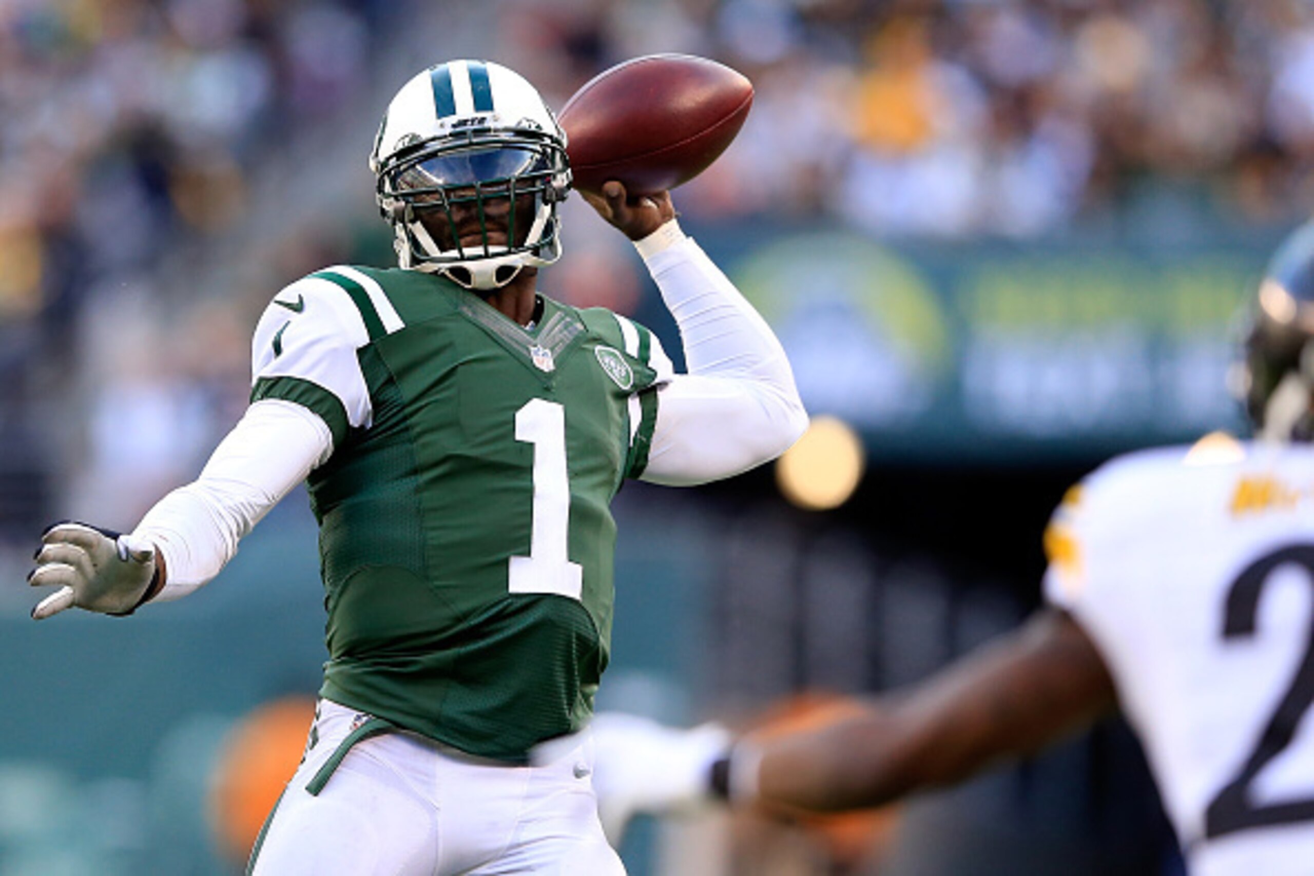 EAST RUTHERFORD, NJ - NOVEMBER 09:  Quarterback Michael Vick #1 of the New York Jets drops back to pass against the Pittsburgh Steelers during a game at MetLife Stadium on November 9, 2014 in East Rutherford, New Jersey.  (Photo by Alex Trautwig/Getty Ima