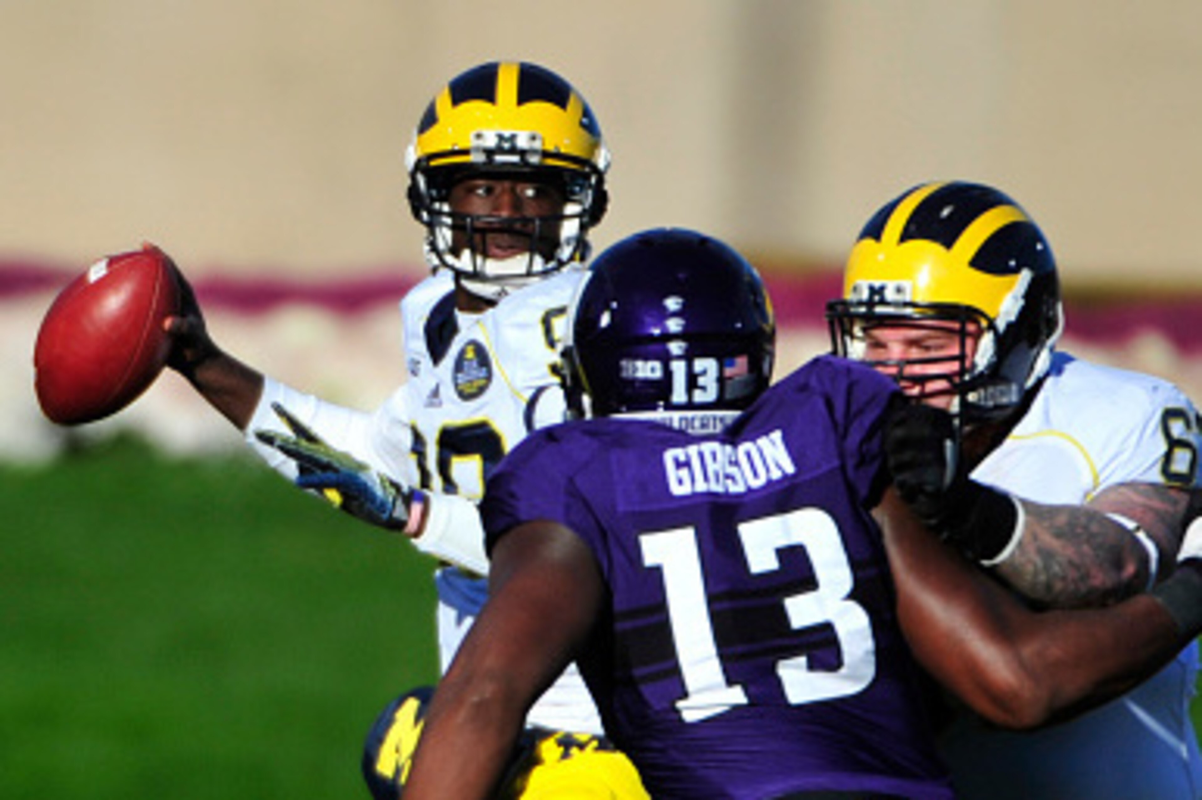 EVANSTON IL - NOVEMBER 08: Devin Gardner #98 of the Michigan Wolverines looks to pass against the Northwestern Wildcats during the first half on November 8, 2014 at Ryan Field in Evanston, Illinois.  (Photo by David Banks/Getty Images)