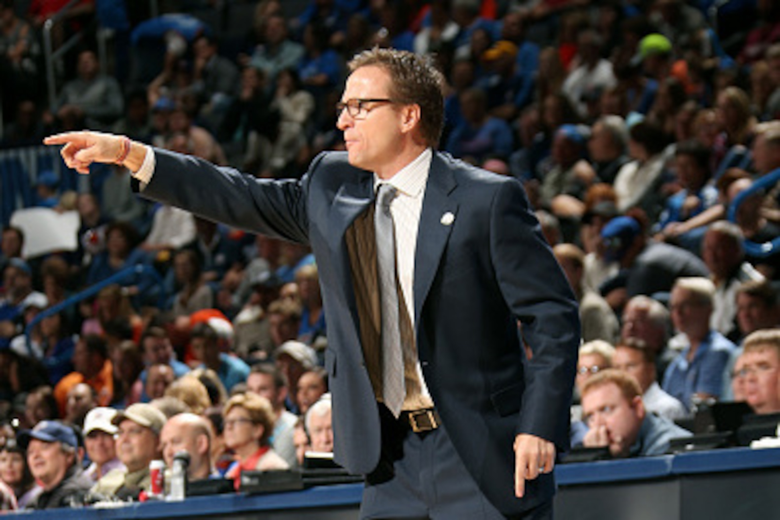 OKLAHOMA CITY, OK- NOVEMBER 9: Scott Brooks Head Coach of the Oklahoma City Thunder calls a play during a game against the Sacramento Kings on November 9, 2014 at Chesapeake Energy Arena in Oklahoma City, OK. NOTE TO USER: User expressly acknowledges and 
