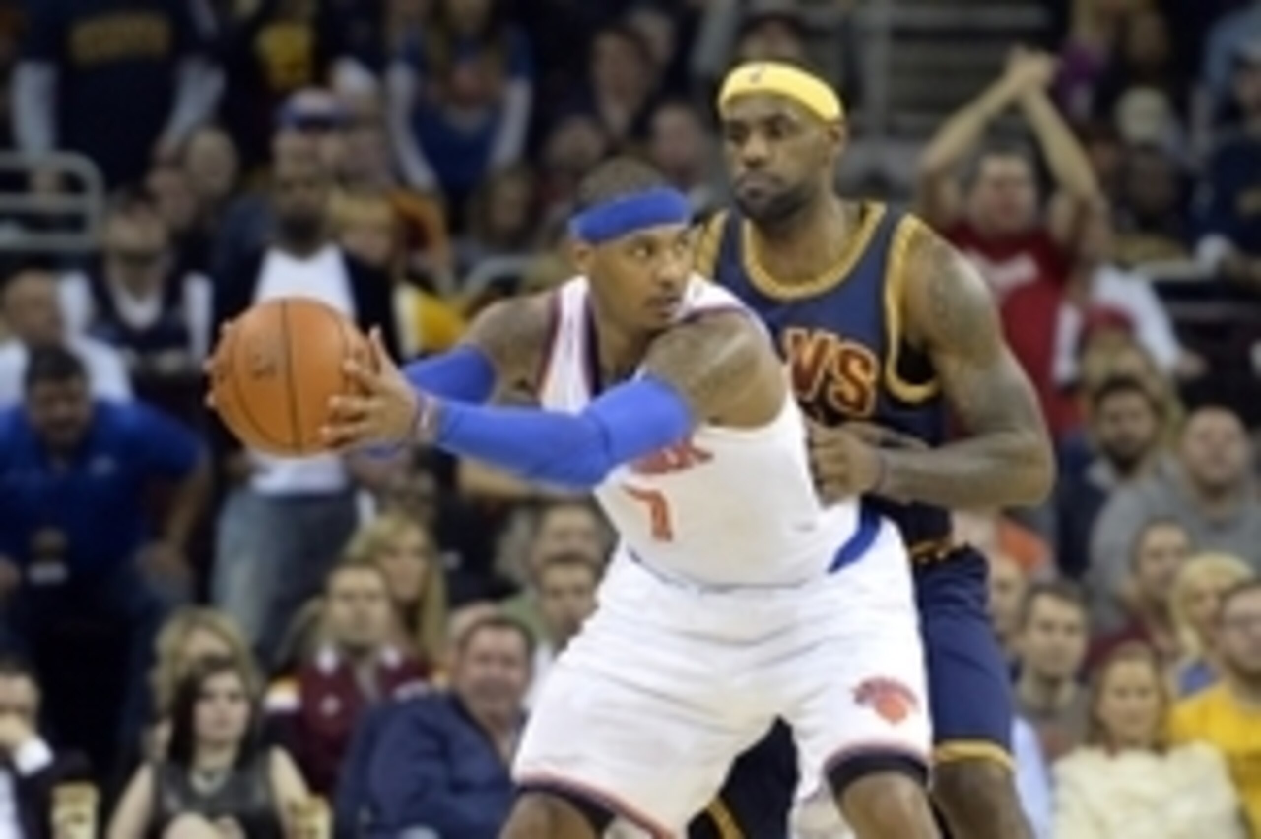 Oct 30, 2014; Cleveland, OH, USA; Cleveland Cavaliers forward LeBron James (23) defends New York Knicks forward Carmelo Anthony (7) at Quicken Loans Arena. New York won 95-90. Mandatory Credit: David Richard-USA TODAY Sports